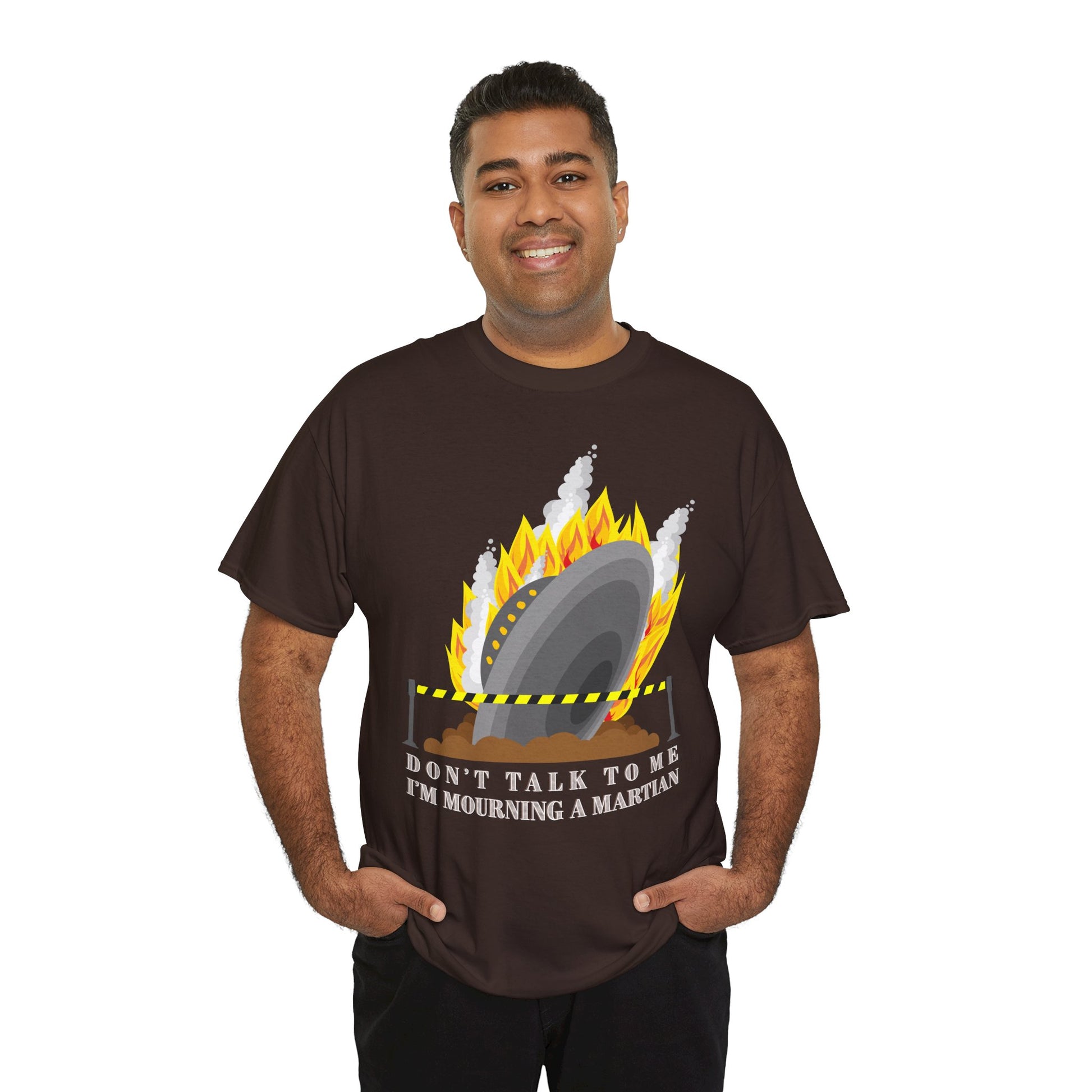 Man wearing a brown t-shirt with a crashed spaceship blocked by caution tape and text 'Don't Talk To Me I'm Mourning A Martian' 