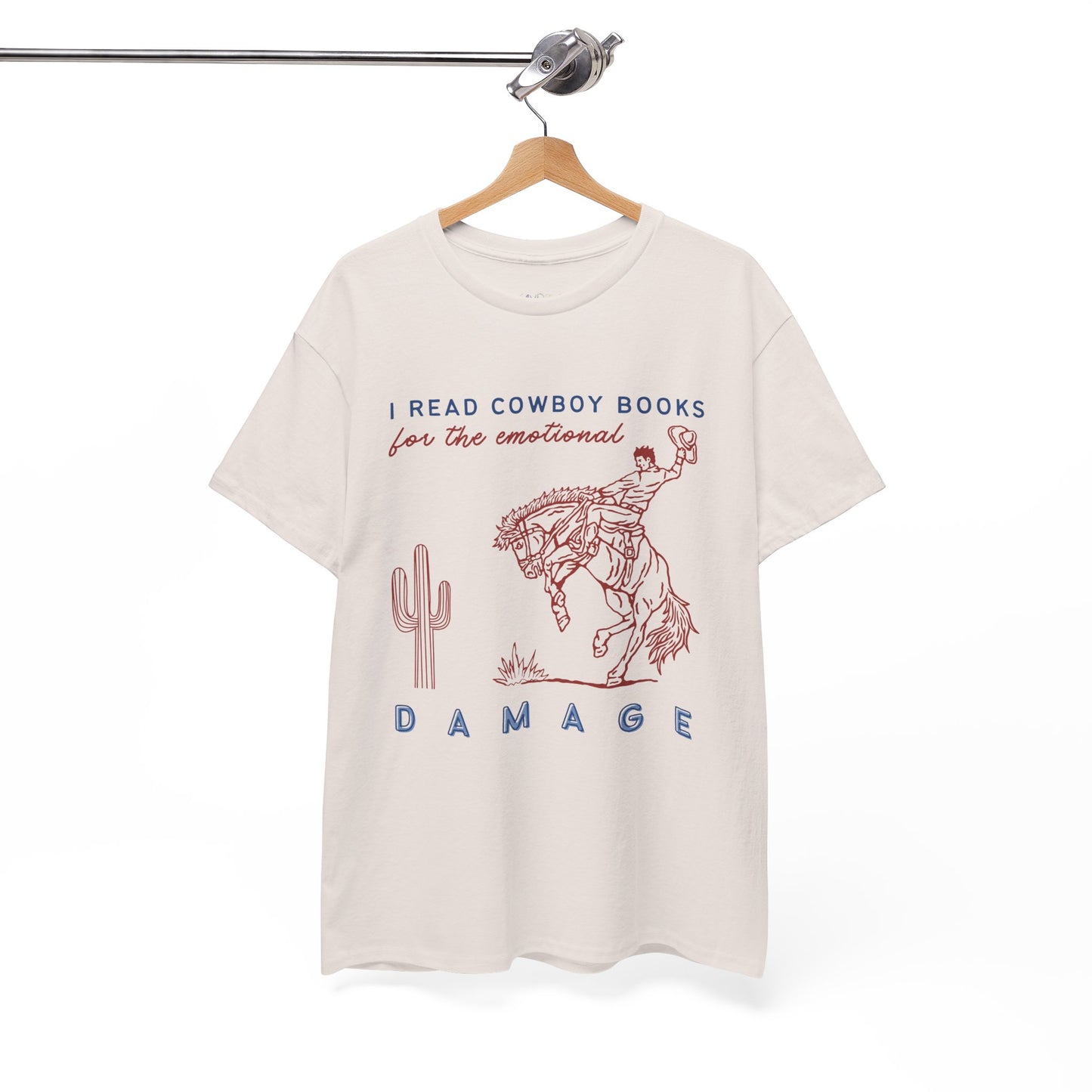 Beige t-shirt with a maroon bucking bronco cowboy graphic and text 'I Read Cowboy Books For The Emotional Damage' 