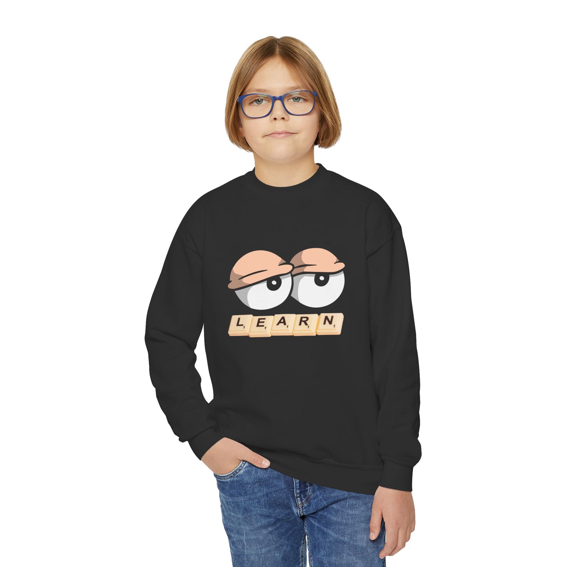 Boy wearing a black sweatshirt with droopy cartoon eyes and 'LEARN' game tile text 