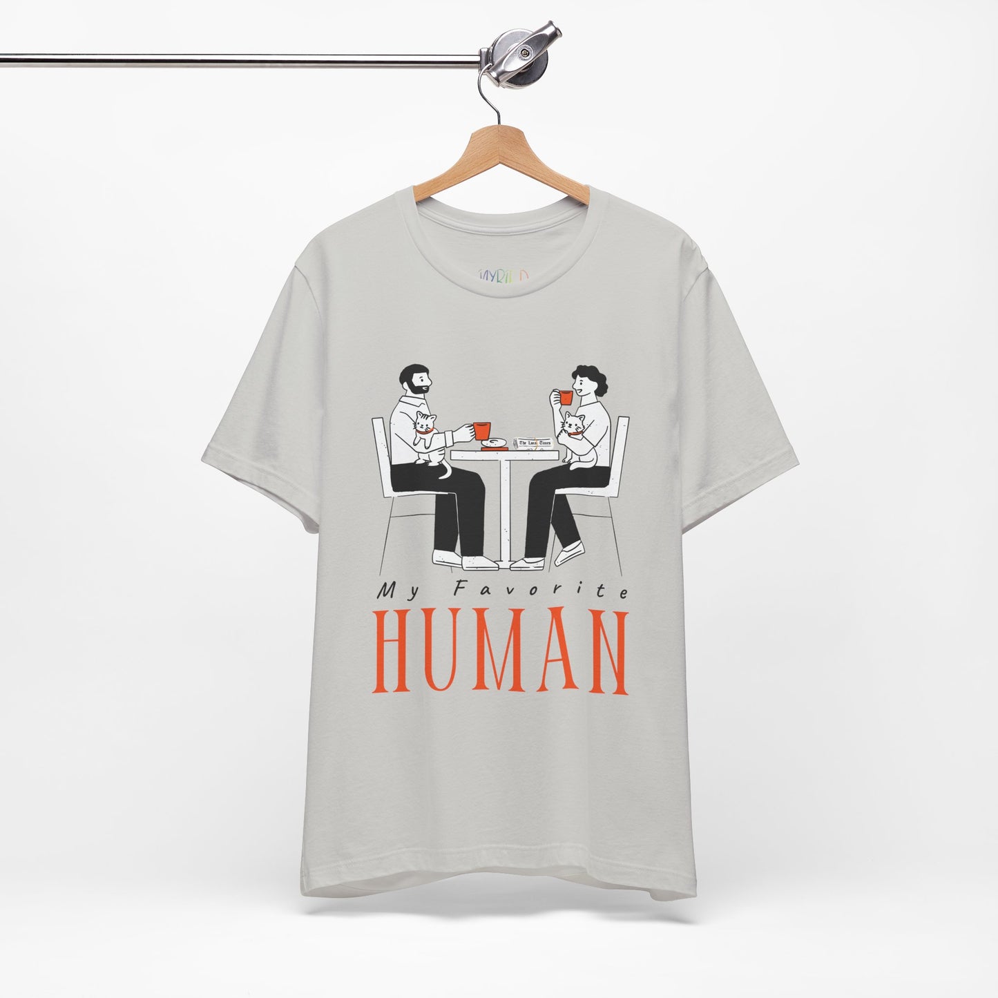 Gray t-shirt with a graphic of two people sitting at a table, newspaper in front of one, drinking hot beverages, holding cats and text 'My Favorite Human' 