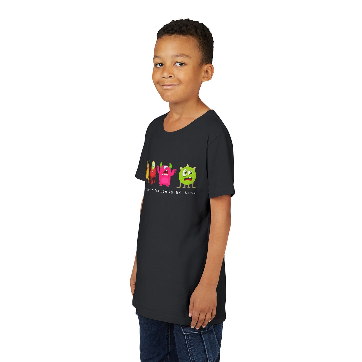 Boy wearing a black t-shirt with a row of frustrated and colorful cartoon monsters, text 'Plot Twists Feelings Be Like'