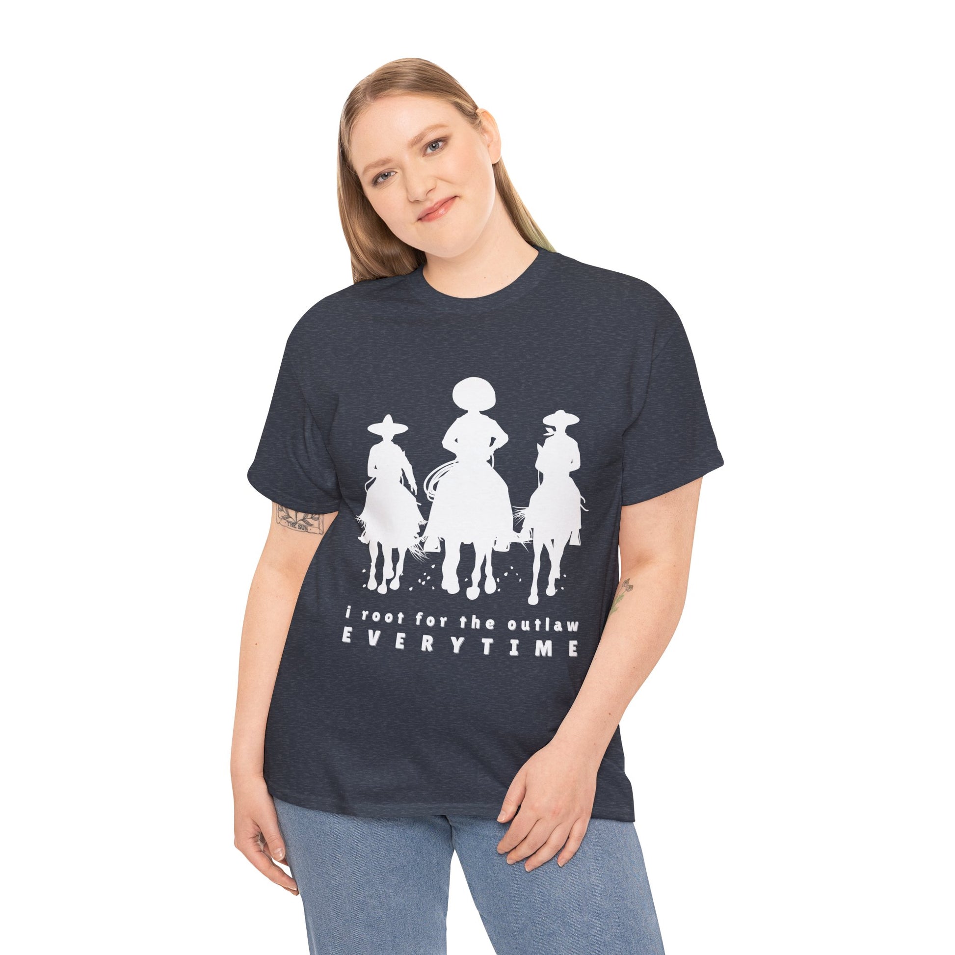 Woman wearing a heather navy t-shirt with white cowboys on horses and text 'I root for the outlaw EVERYTIME'