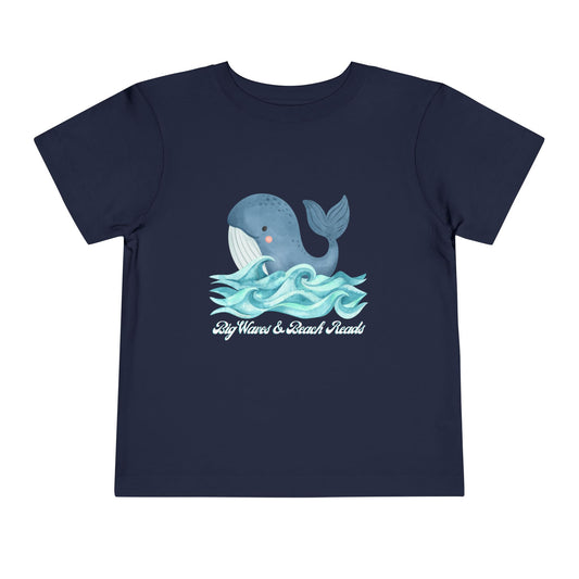 Navy blue toddler t-shirt with a whale graphic and text 'Big Waves & Beach Reads'
