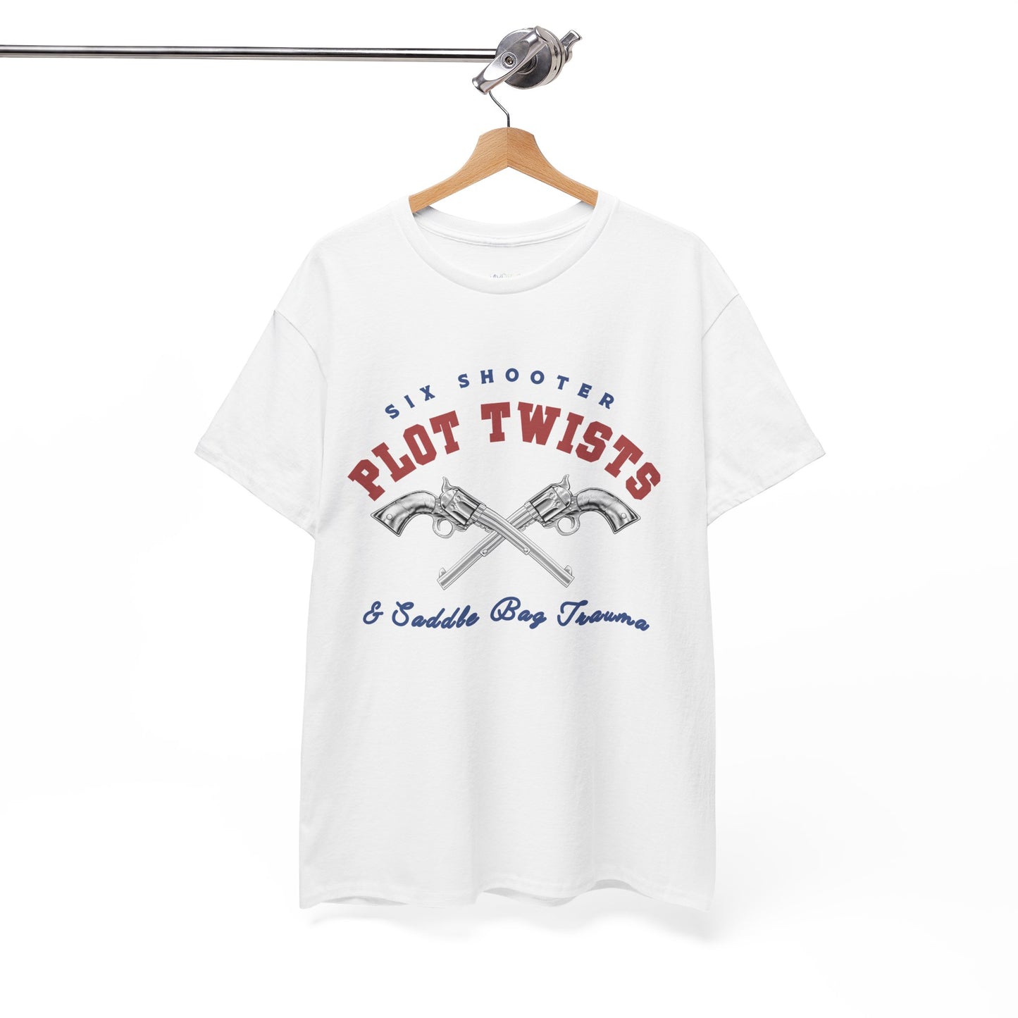 White t-shirt with two pistols criss-crossed in the center and text 'Six Shooter Plot Twists & Saddle Bag Trauma'