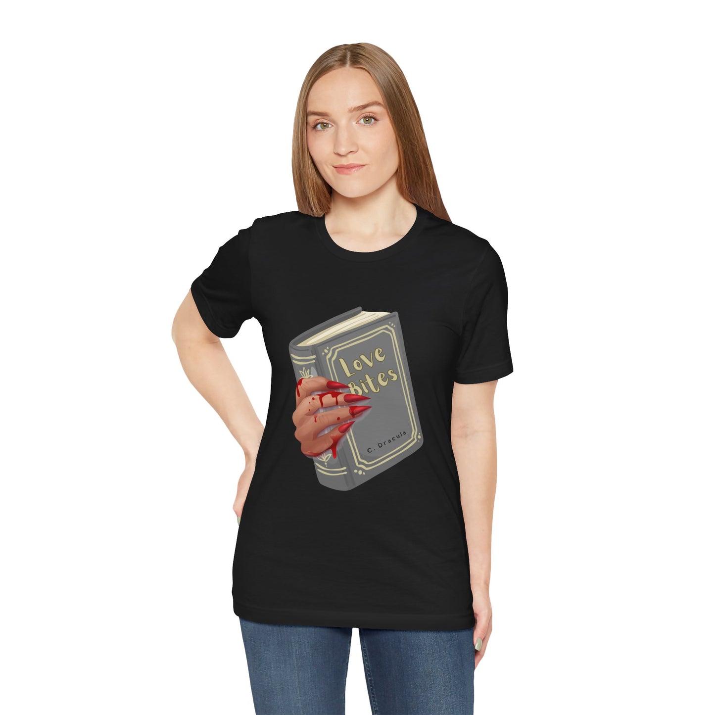 Woman wearing a black t-shirt with graphic design of a creepy and bloody hand holding a book titled 'Love Bites' by C. Dracula