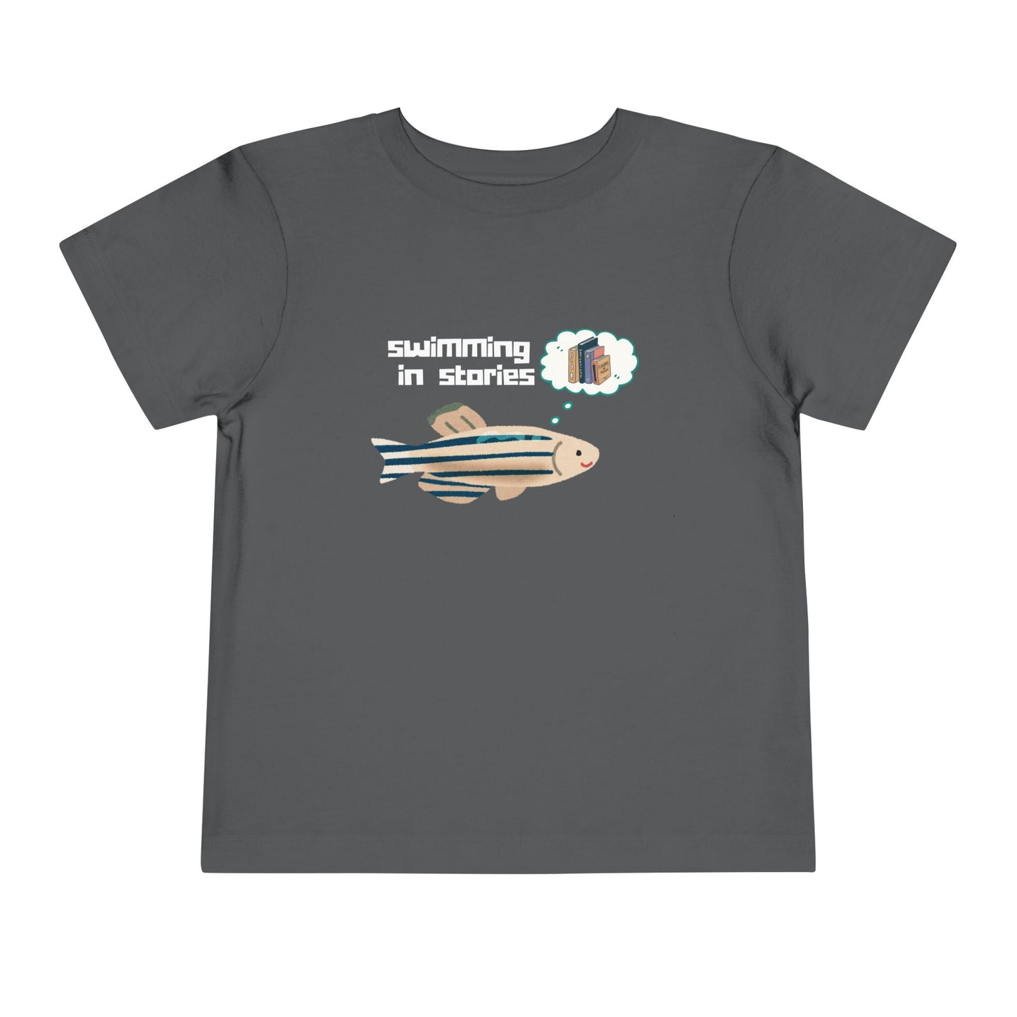 Gray t-shirt with a fish graphic, thought bubble picturing books, and text 'swimming in stories' 