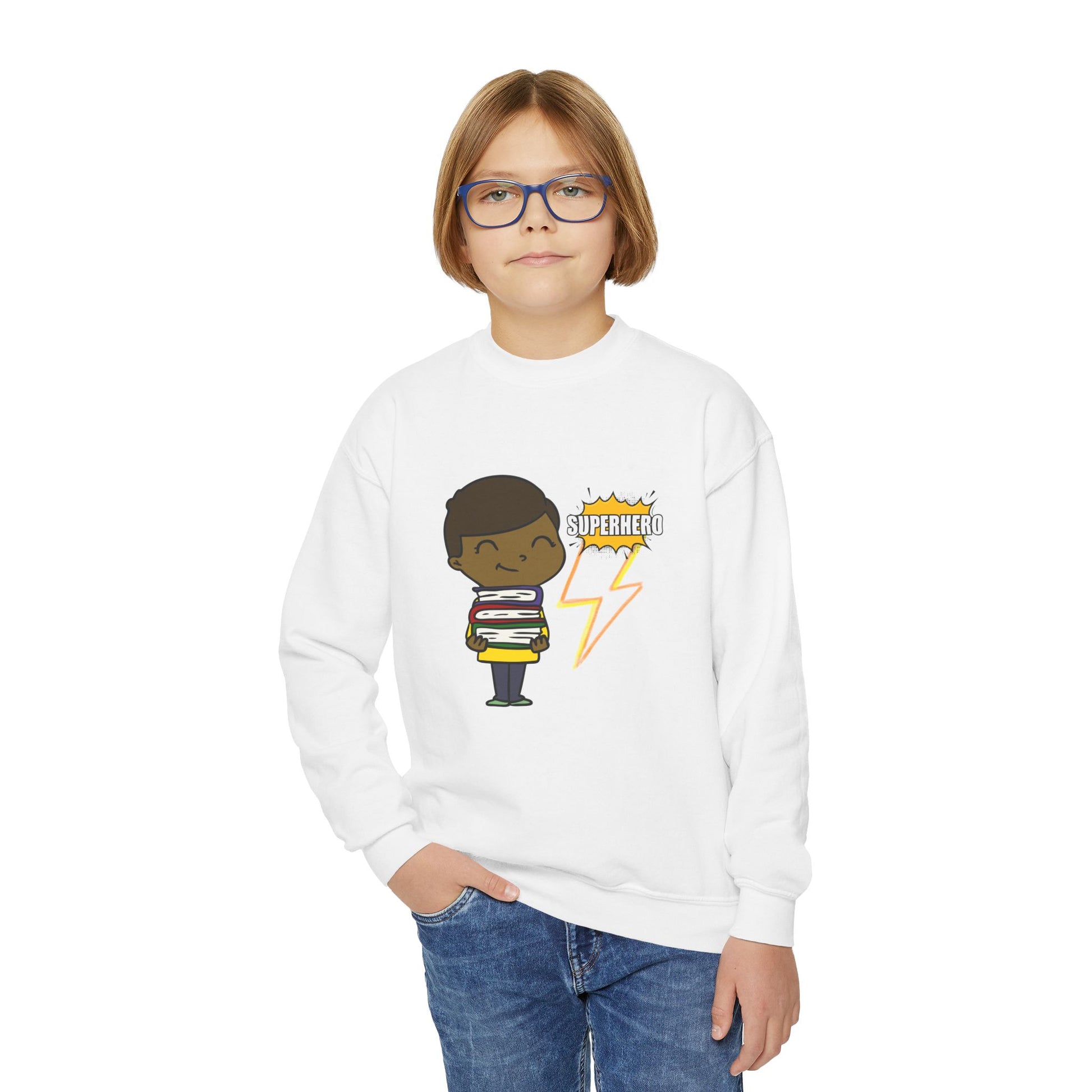Boy wearing a white sweatshirt with a cartoon kid holding a stack of books and a lightning bolt with text 'Superhero' 