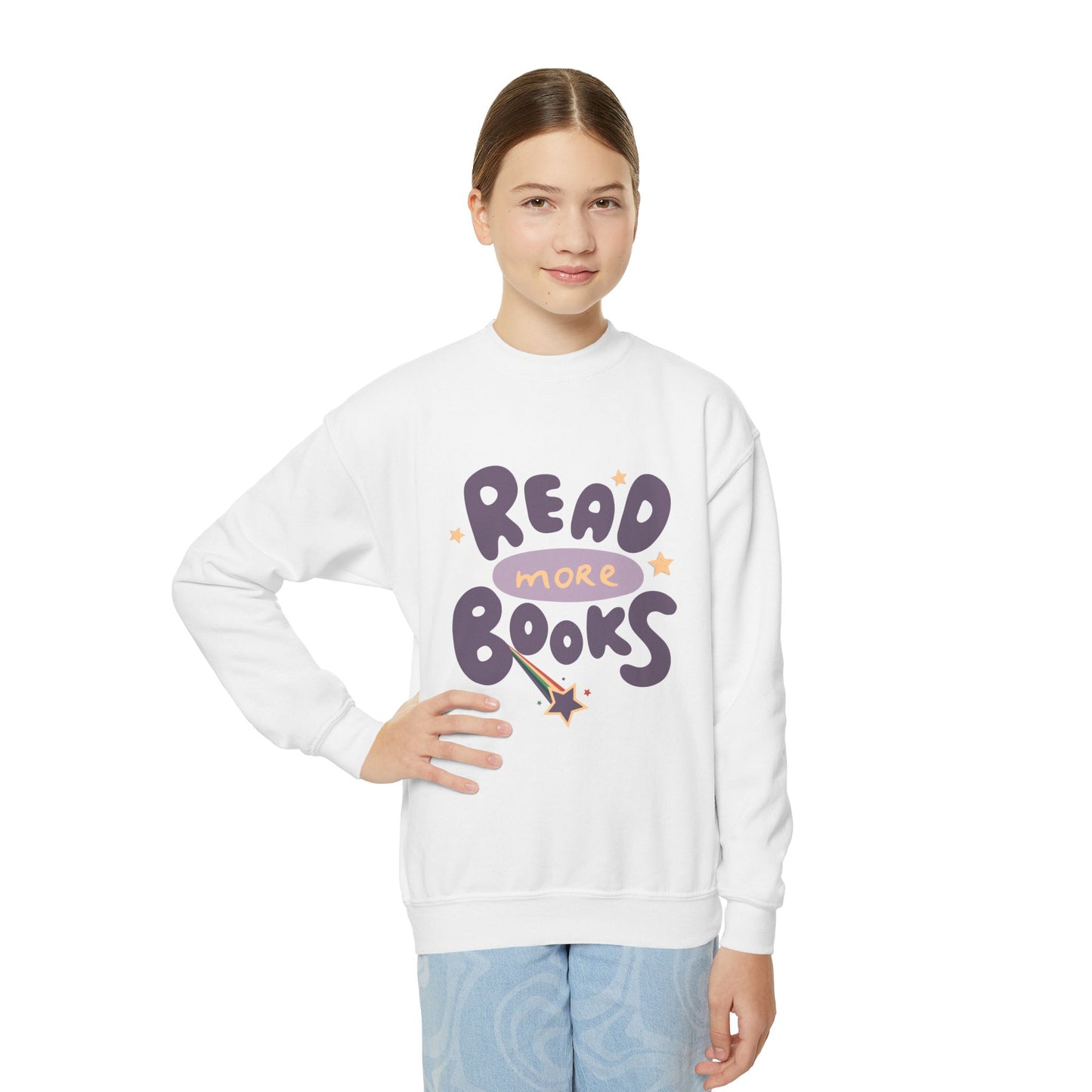 Girl wearing a white sweatshirt with 'Read More Books' text and a shooting star