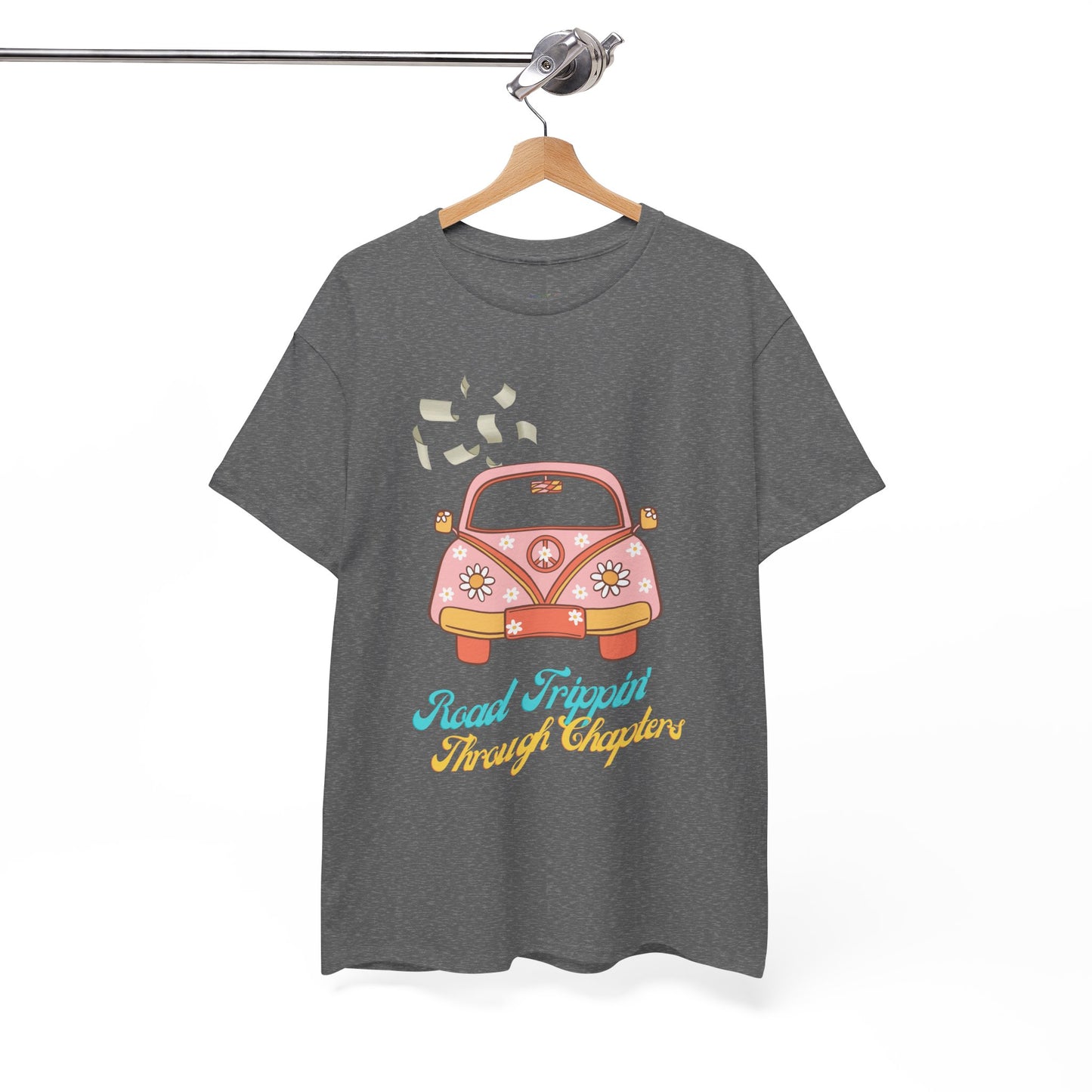 Gray t-shirt with a retro pink car , pages flying out the windows and text 'Road Tripping Through Chapters' 