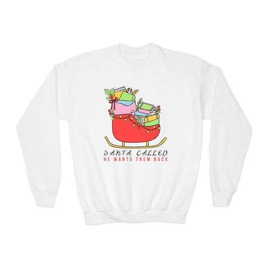 White sweatshirt with a red sleigh full of books and text 'Santa called he wants them back' on a white background.
