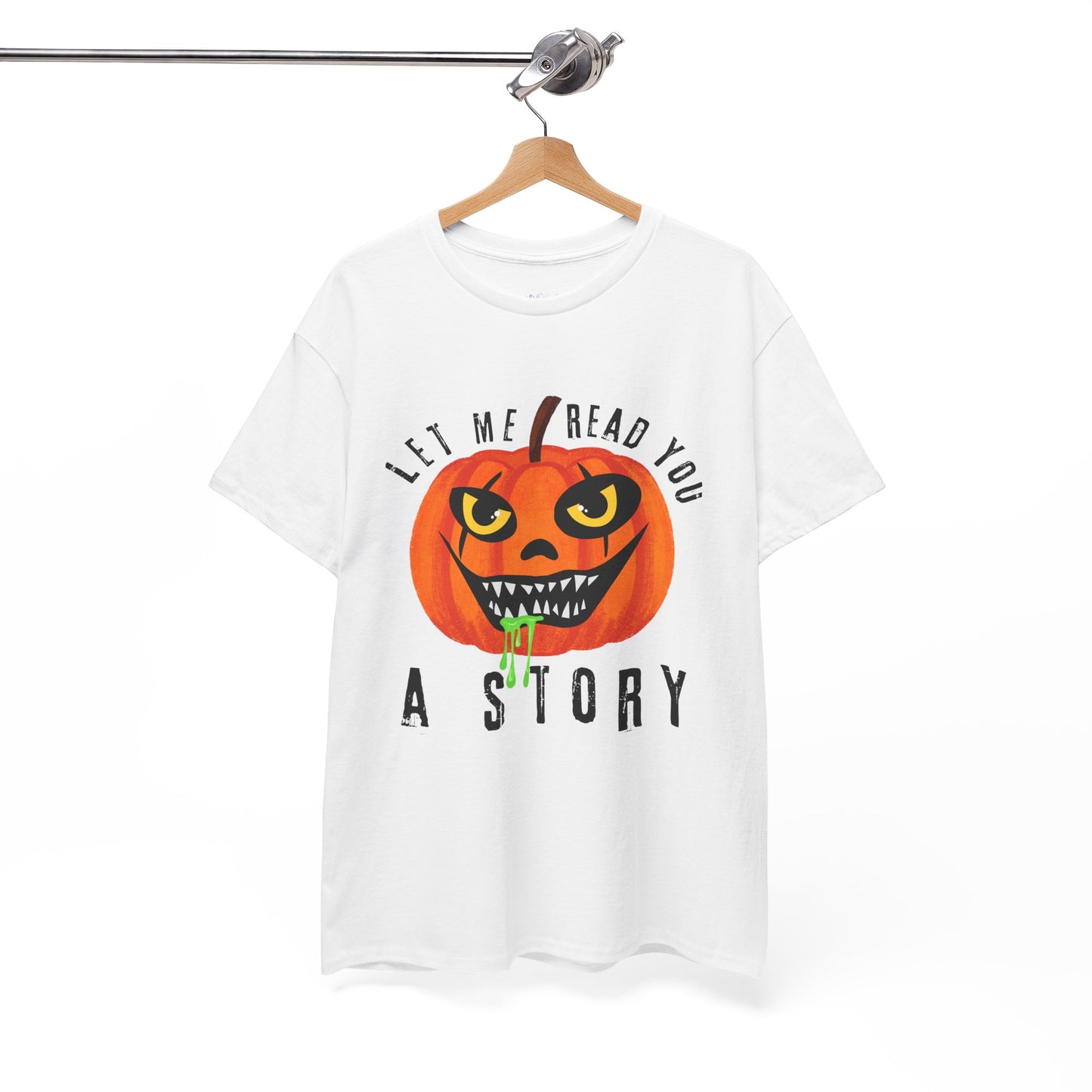 White t-shirt with an evil pumpkin graphic and text 'Let Me Read You A Story' on a hanger against a white background