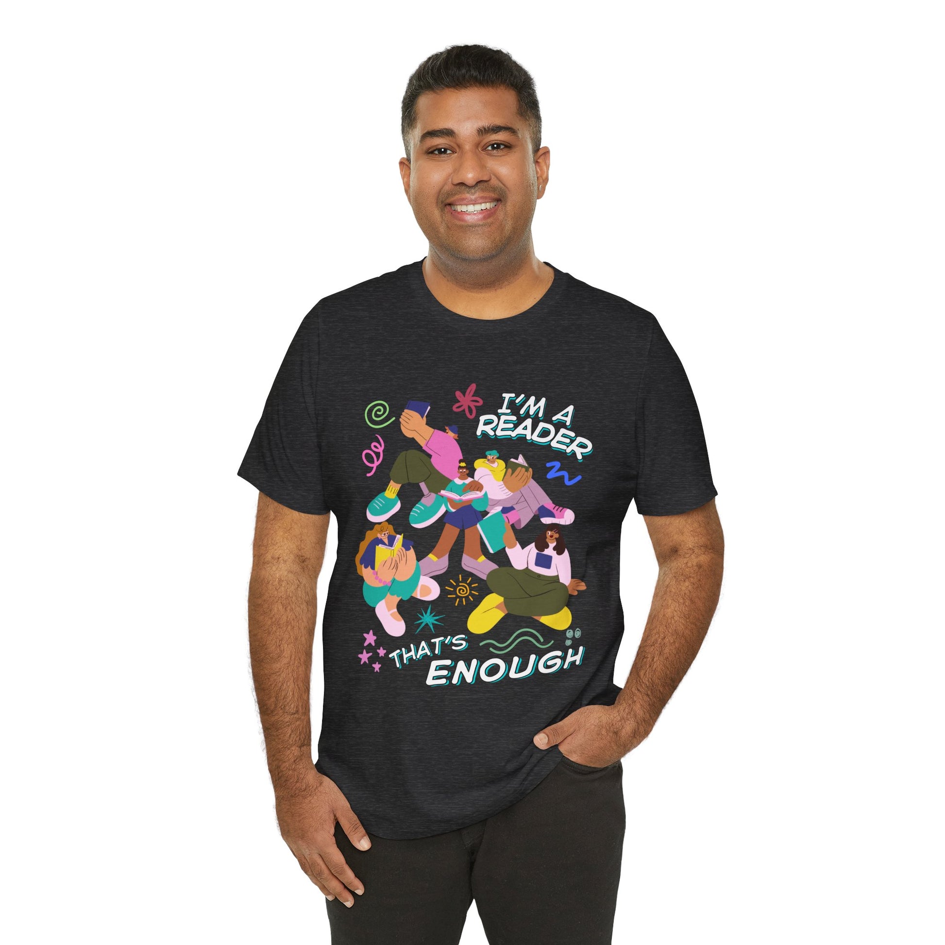 Man wearing a dark gray t-shirt with modern people reading books, surrounded by colorful doodles and playful text 'I'm a Reader That's Enough' 