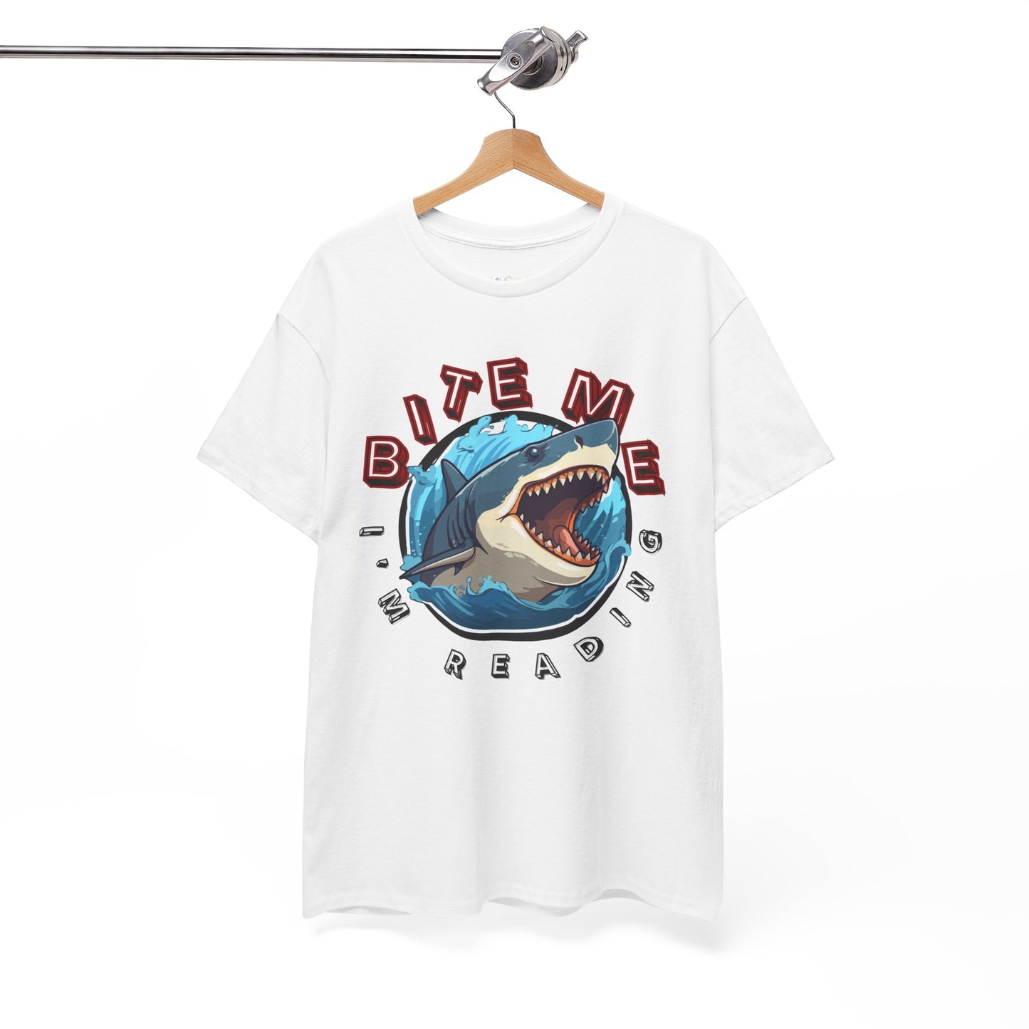 White t-shirt with a shark graphic bursting out of the center and text 'Bite Me I'm Reading' 