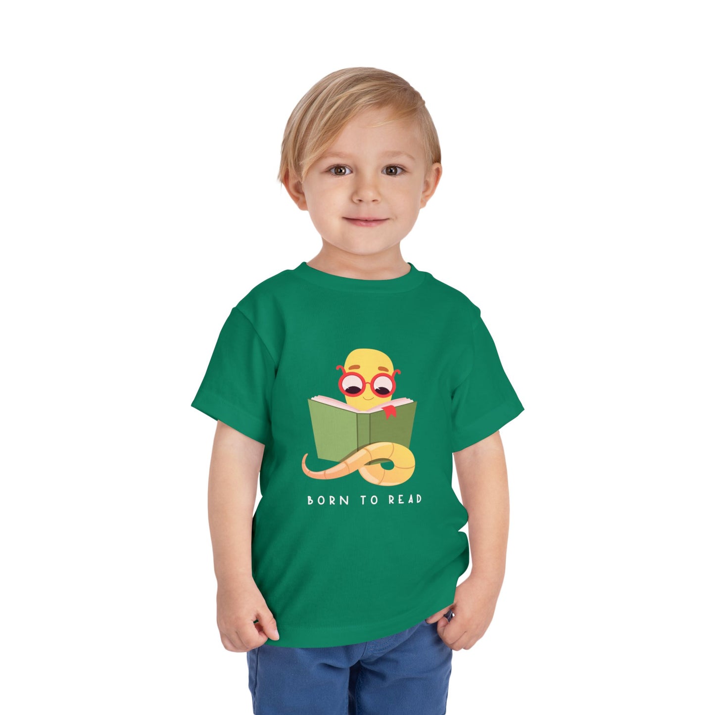 Child wearing a green toddler t-shirt with a book worm reading a book and 'Born to Read' text 