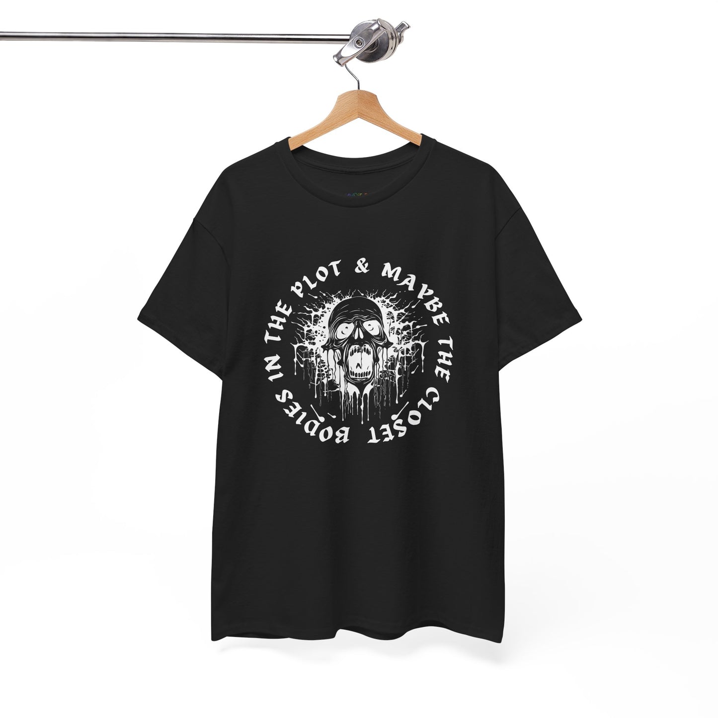 Black t-shirt with graphic of a screaming skull and text 'Bodies In The Plot & Maybe The Closet' on a hanger against a white background