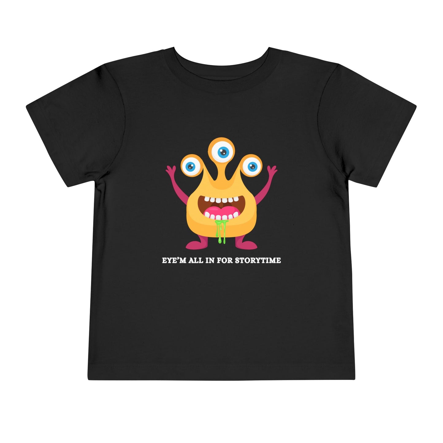 Black toddler t-shirt with a drooling, three-eyed monster graphic and text 'Eye'm all in for storytime' on a white background