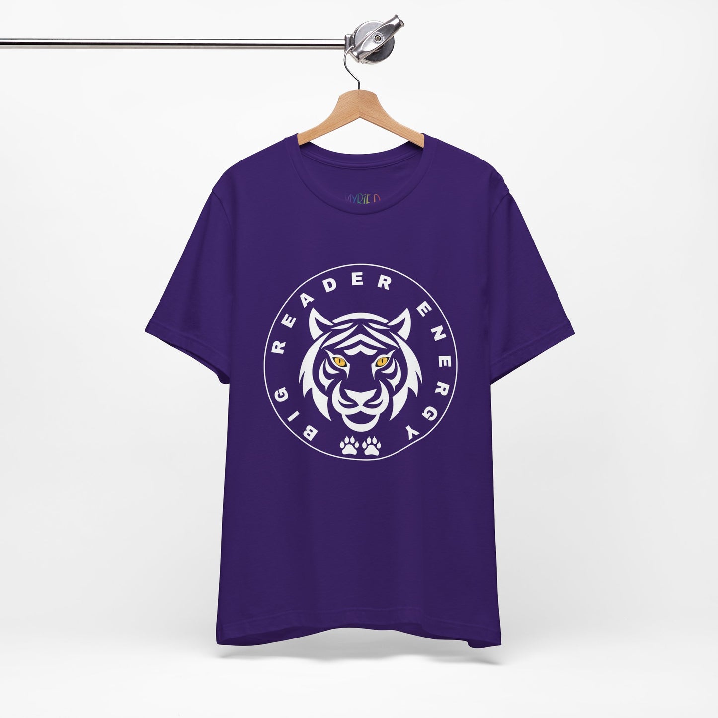 Purple t-shirt with a black tiger logo, yellow eyes and circled by text 'Big Reader Energy'