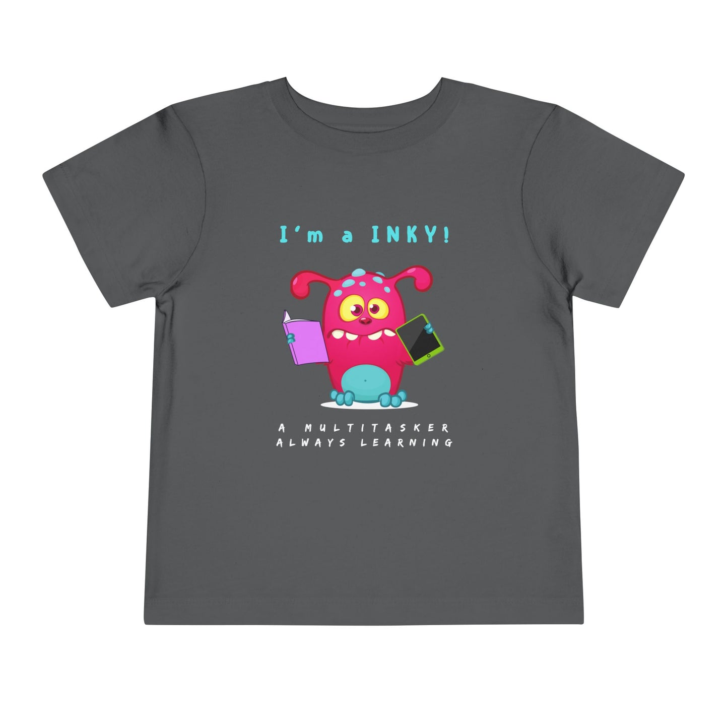 Gray toddler personality t-shirt with a colorful cartoon monster holding a book and i-pad while proudly proclaiming 'I'm A Inky!' Sub-text "A Multitasker, Always Learning' on a white background