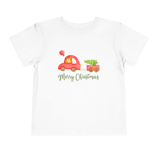 White t-shirt with a red car and green tree design and 'Merry Christmas' text on a white background