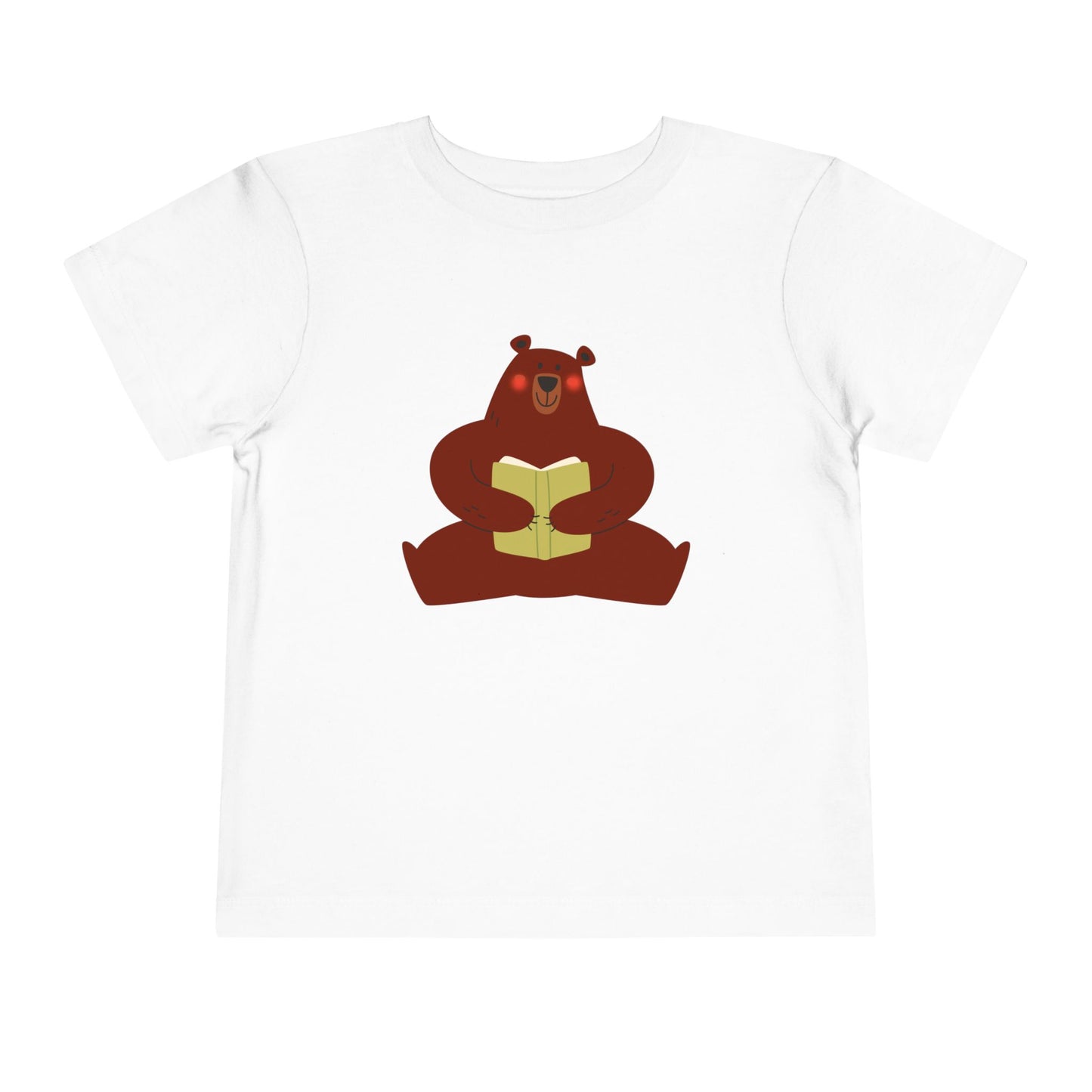 White t-shirt with a blushing sear holding a book