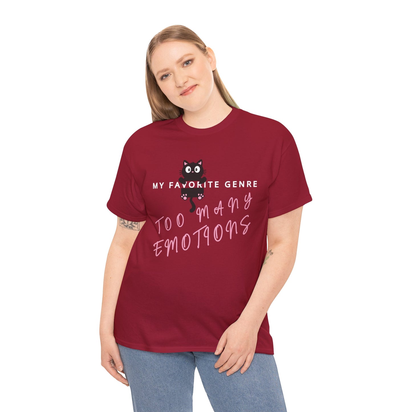Woman wearing a red t-shirt with a black cat graphic hanging onto a word and text 'My Favorite Genre - Too Many Emotions' 