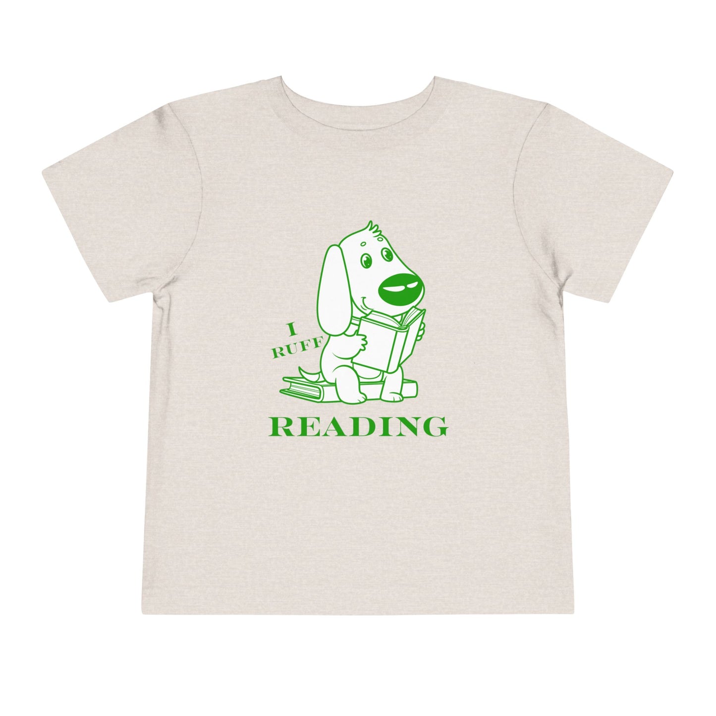 Beige toddler t-shirt with green and white graphic of a dog reading a book and text 'I RUFF READING'