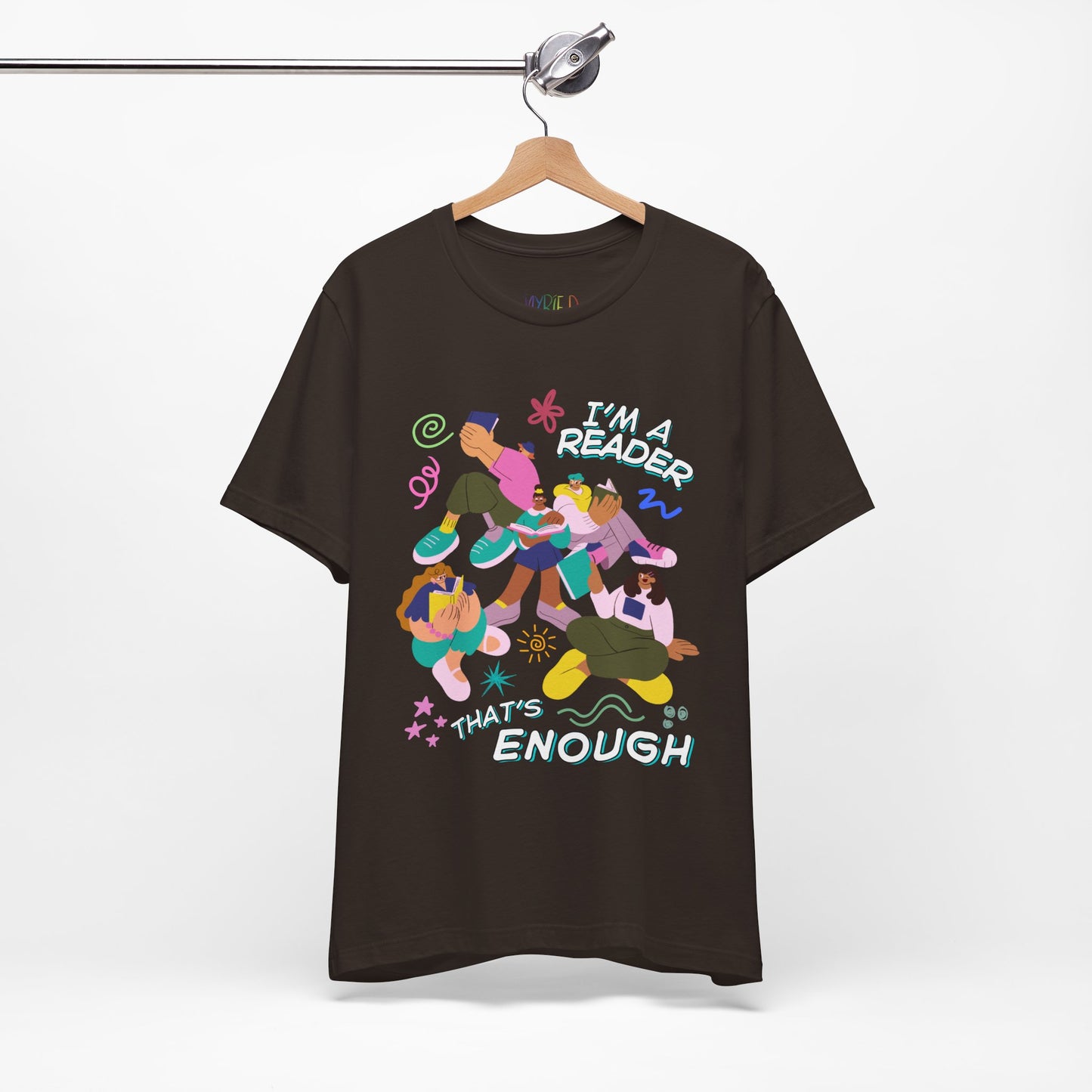 Brown t-shirt with modern people reading books, surrounded by colorful doodles and playful text 'I'm a Reader That's Enough' 