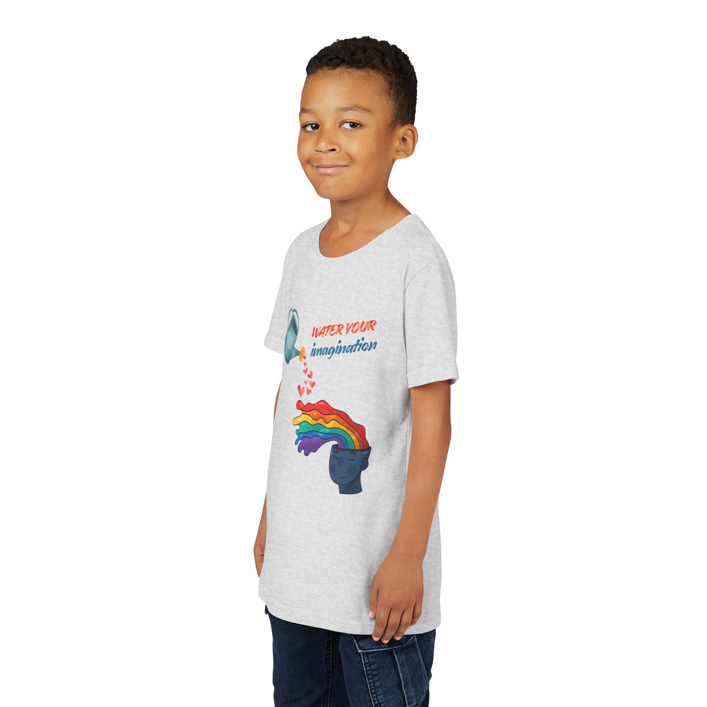 Boy wearing a light gray t-shirt with watering can pouring hearts into a watercolor rainbow brain with text 'Water your imagination' 