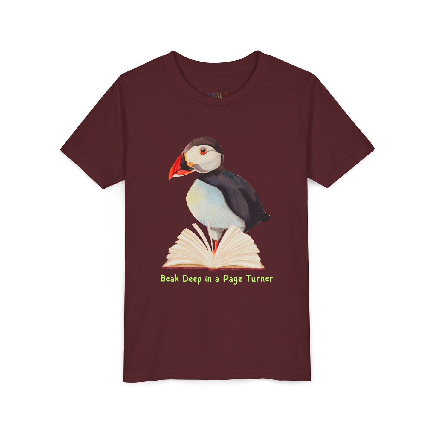 Maroon t-shirt with a puffin, open book and text 'Beak Deep in a Page Turn' 