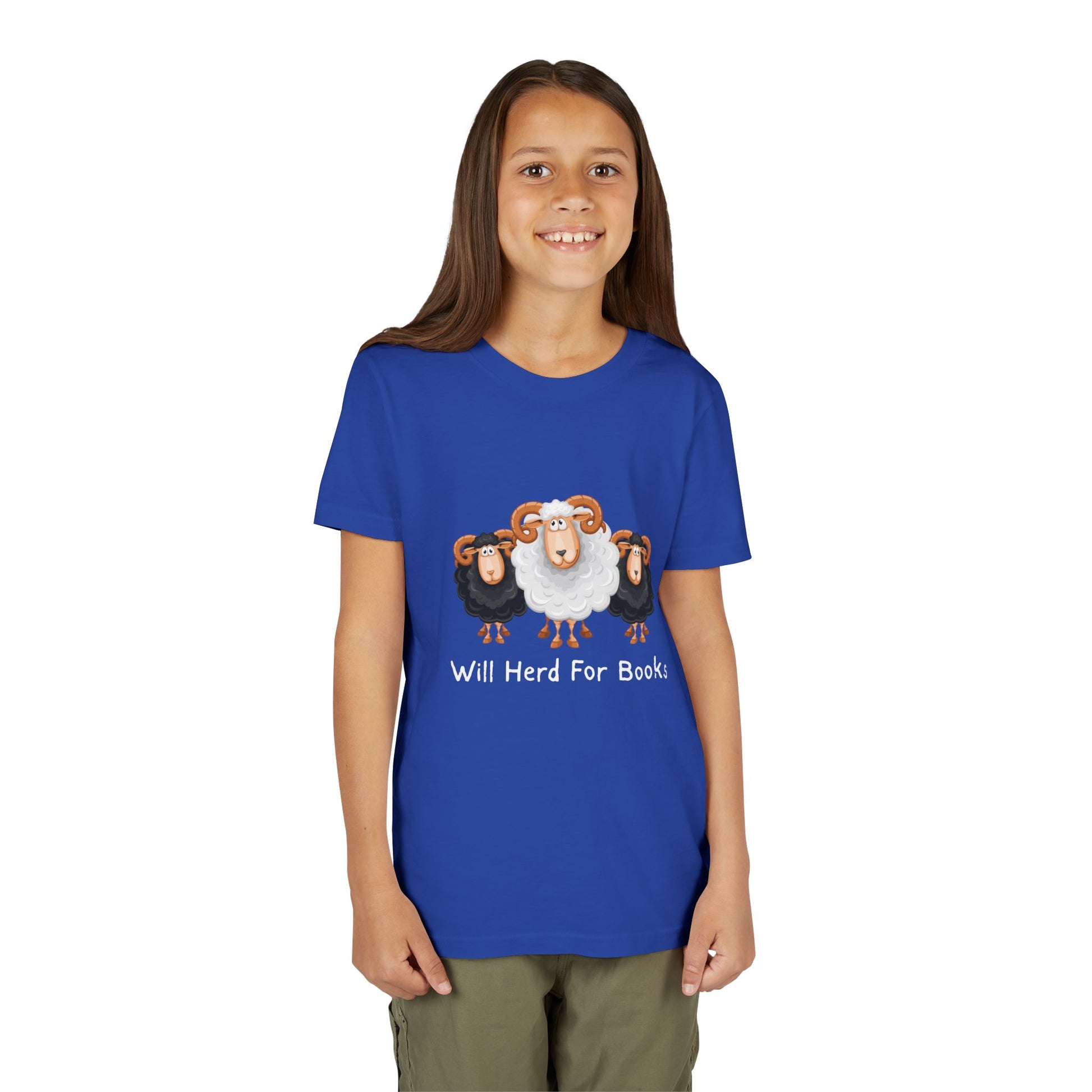Girl wearing a blue t-shirt with cartoon sheep and text 'Will Herd For Books' 