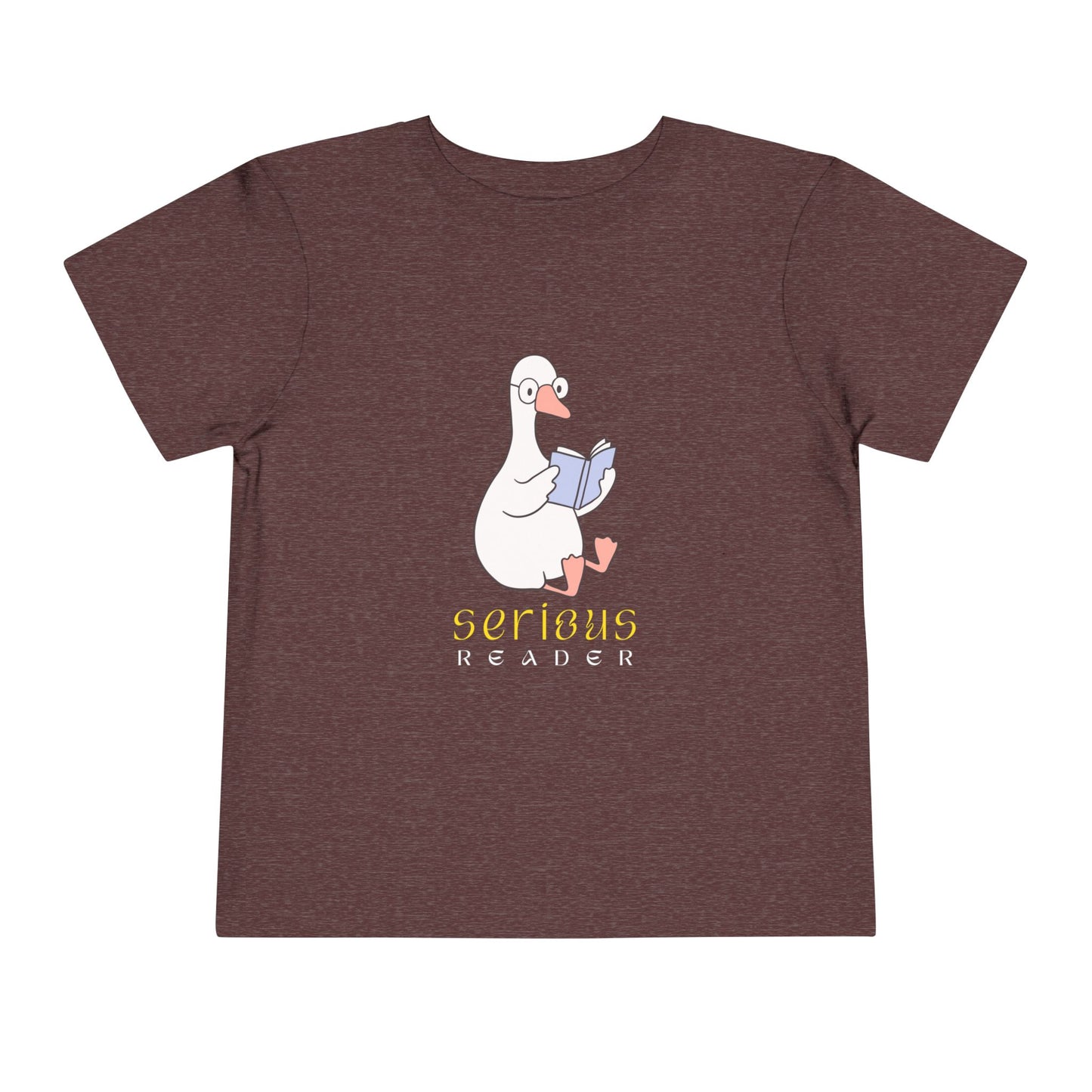Maroon t-shirt with a cartoon duck or goose reading a book and 'Serious Reader' text 