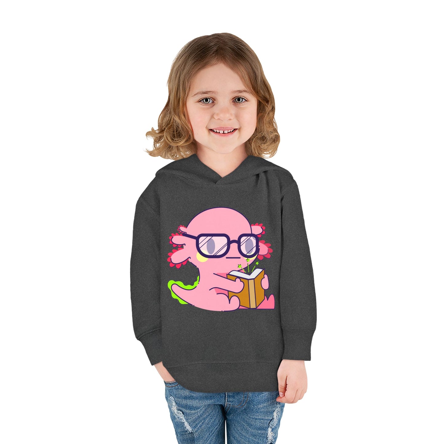 Girl wearing a dark gray toddler hoodie with a pink axolotl holding a book and wearing glasses 