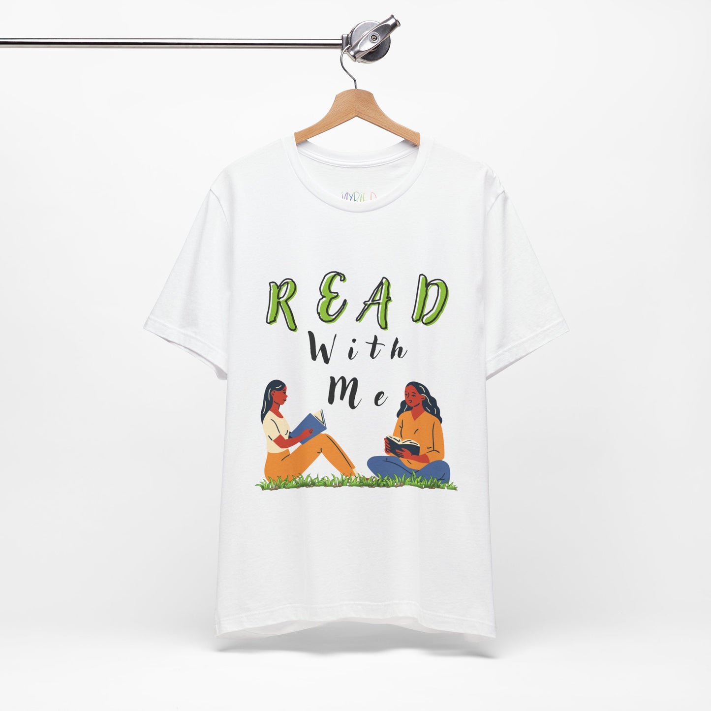 White t-shirt with 'Read With Me' text and illustrations of two people reading 
