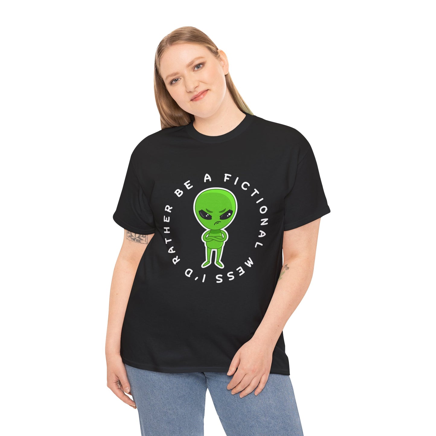 Woman wearing a black t-shirt with a grumpy faced, cross armed green alien, and text 'I'd Rather Be A Fictional Mess'