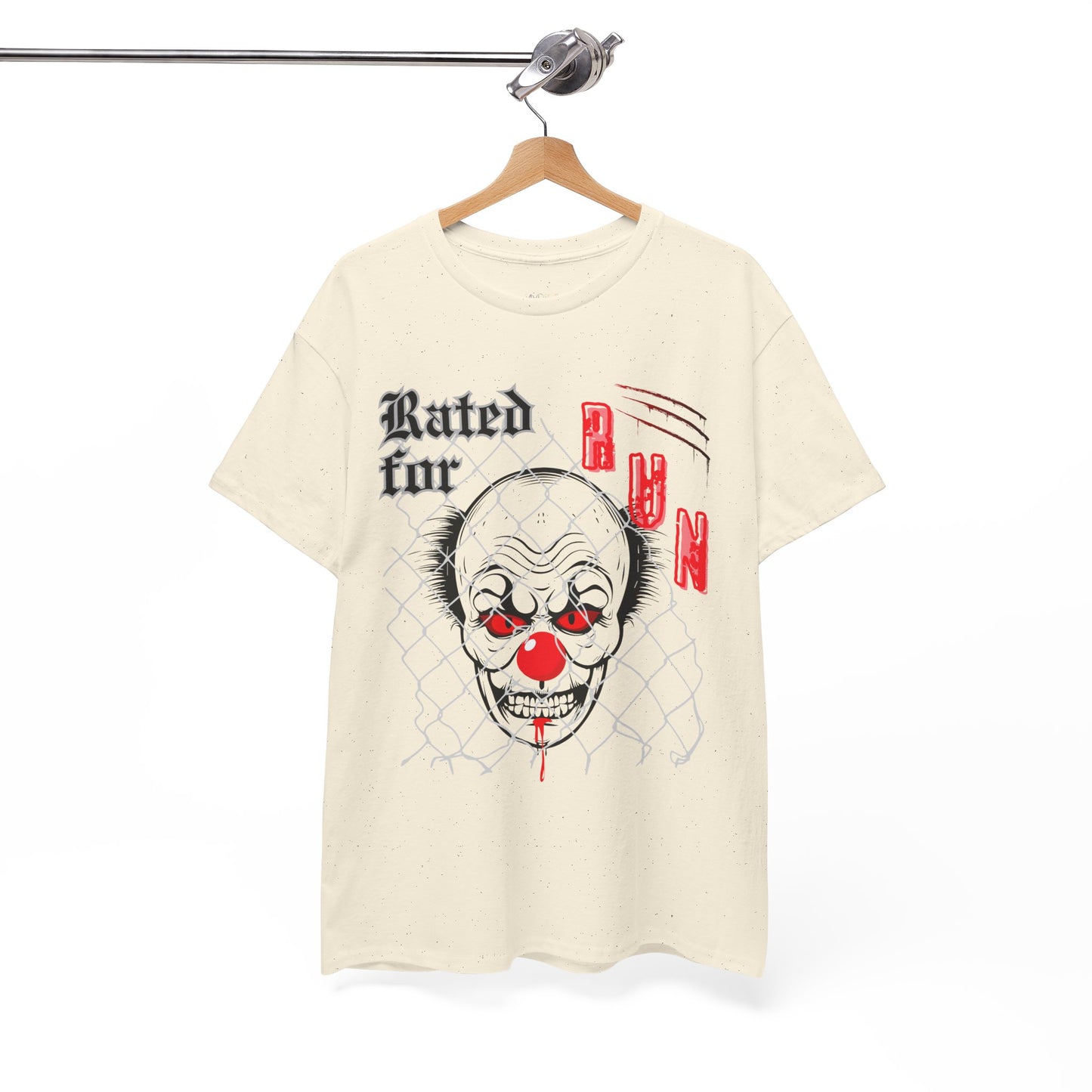 Beige horror t-shirt with a graphic design of a scary clown face behind chain linked fence and text 'Rated for R' on a hanger against a white background