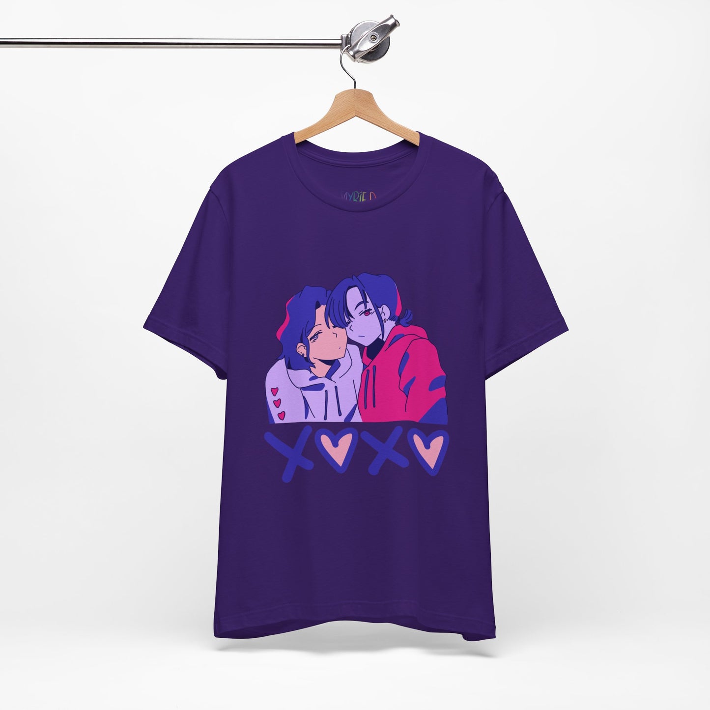 Purple t-shirt with an anime pink, purple and blue graphic design of two people leaning in together above a row of XOXO (O's in the shape of hearts)