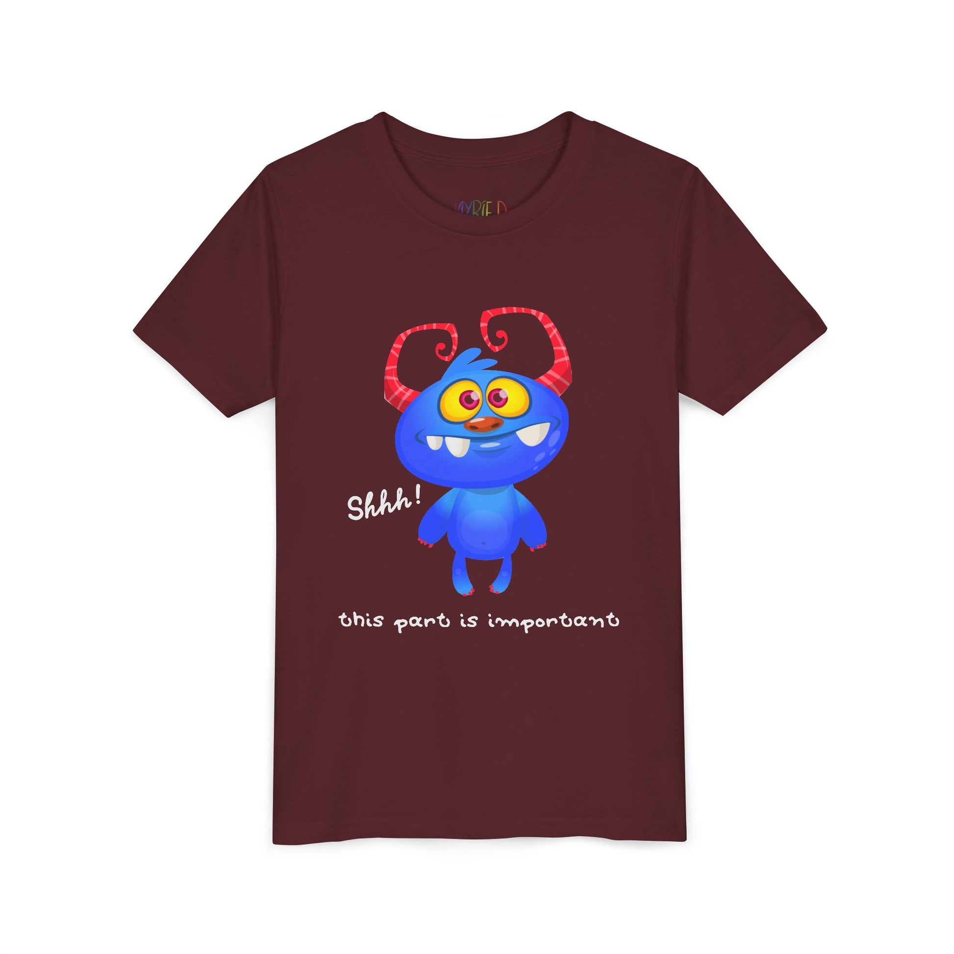 Maroon t-shirt with a wide-eyed, gap toothed, blue cartoon monster and text 'Shhh! This part is important.'