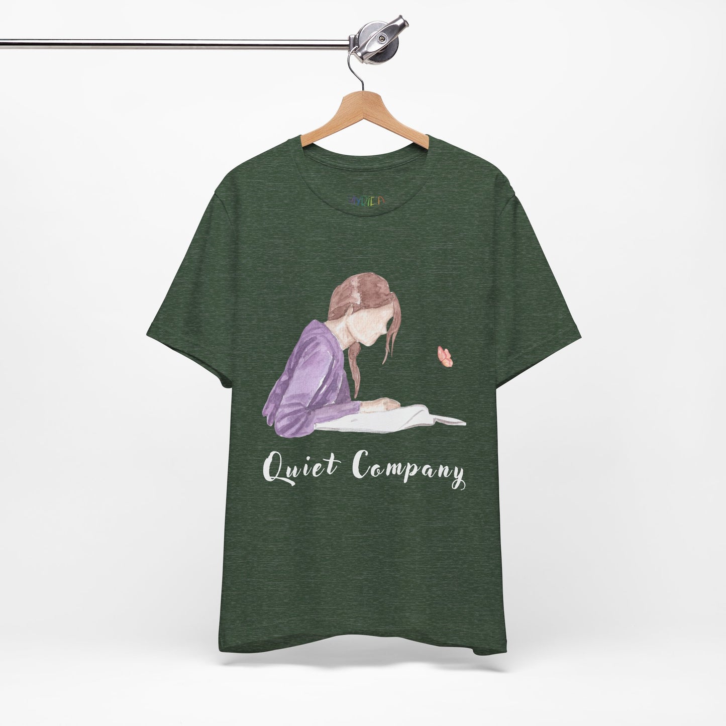 Forest green t-shirt with a graphic of a girl reading a book and the text 'Quiet Company' 