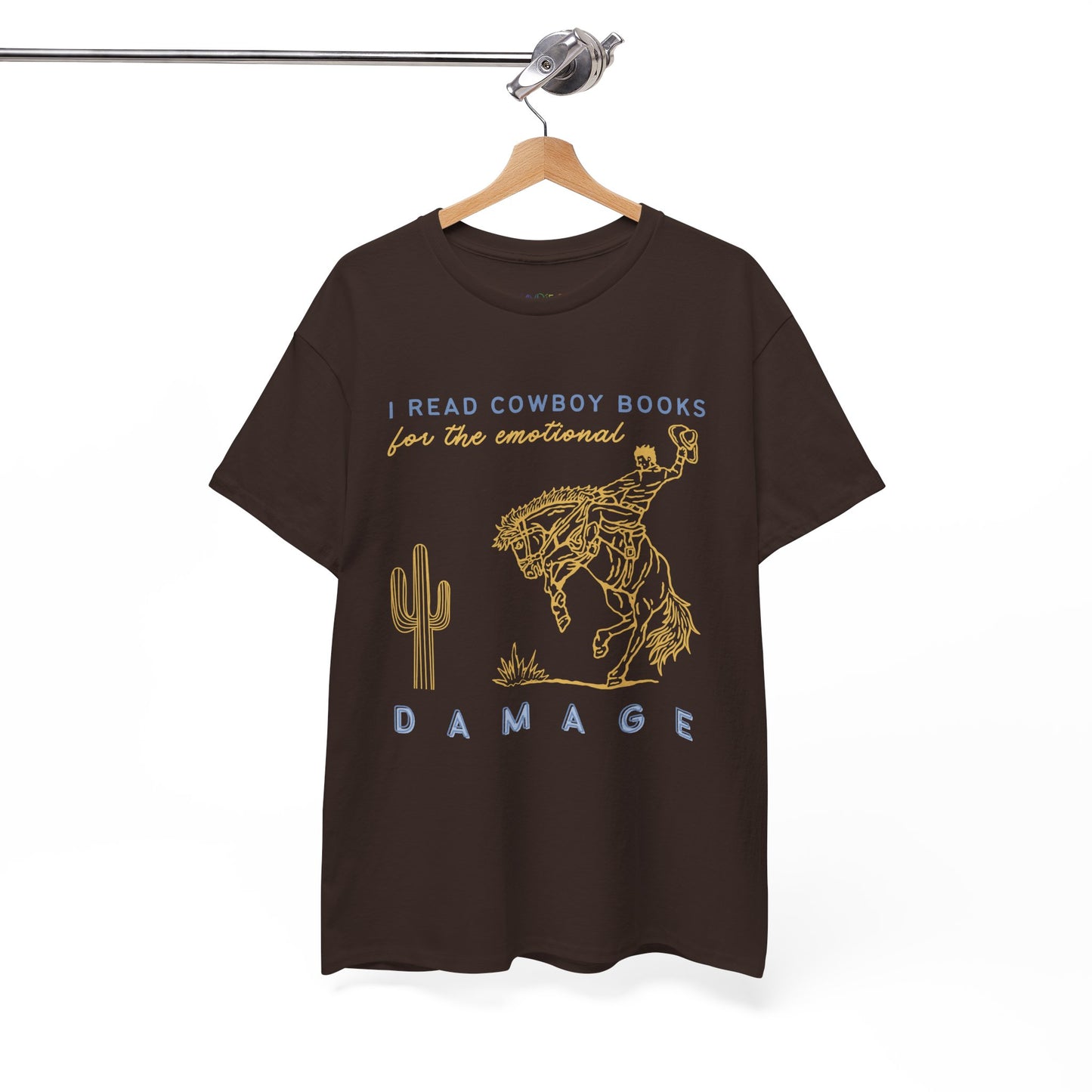 Brown t-shirt with gold bucking bronco cowboy graphic and text 'I Read Cowboy Books For The Emotional Damage' 