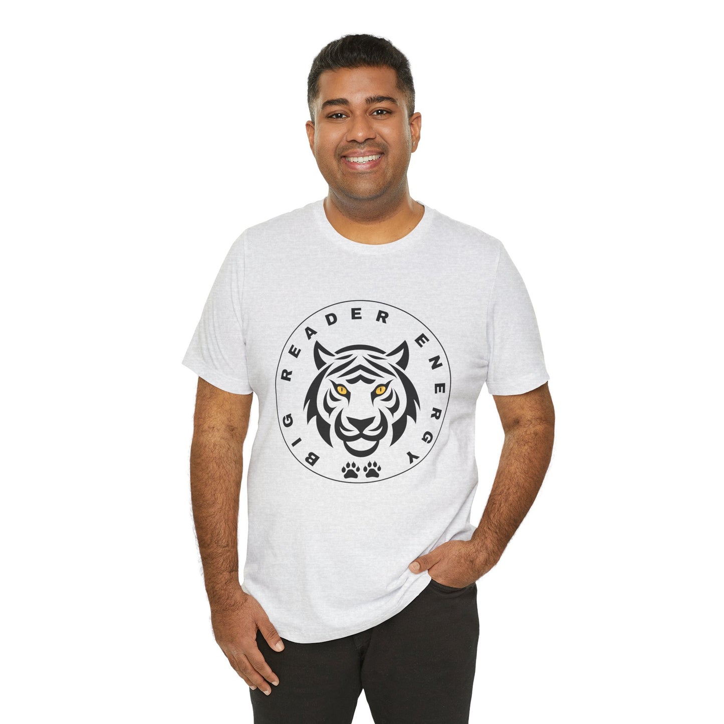 Man wearing a light gray t-shirt with a black tiger logo, yellow eyes and circled by text 'Big Reader Energy'