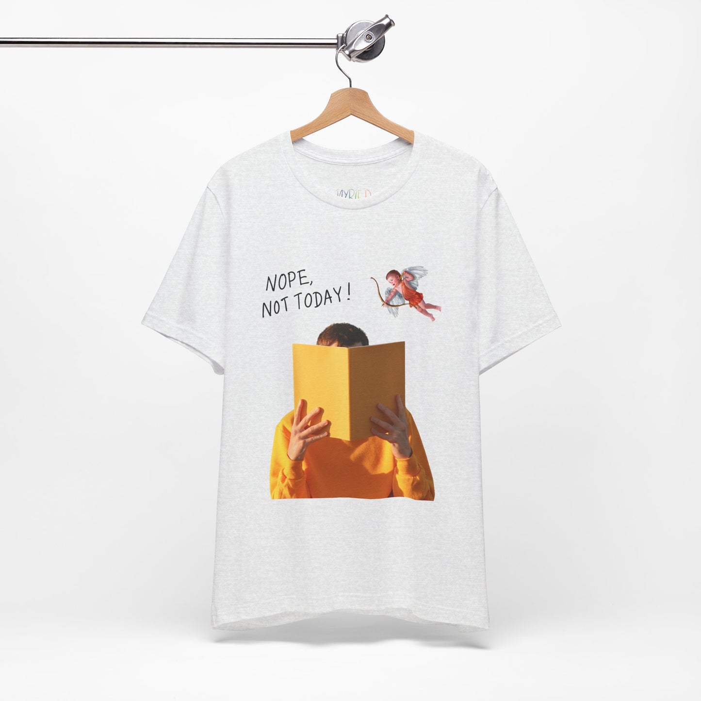 Ash t-shirt with graphic design of person holding a book in front of their face while cupid is hovering above and text 'NOPE, NOT TODAY!' 
