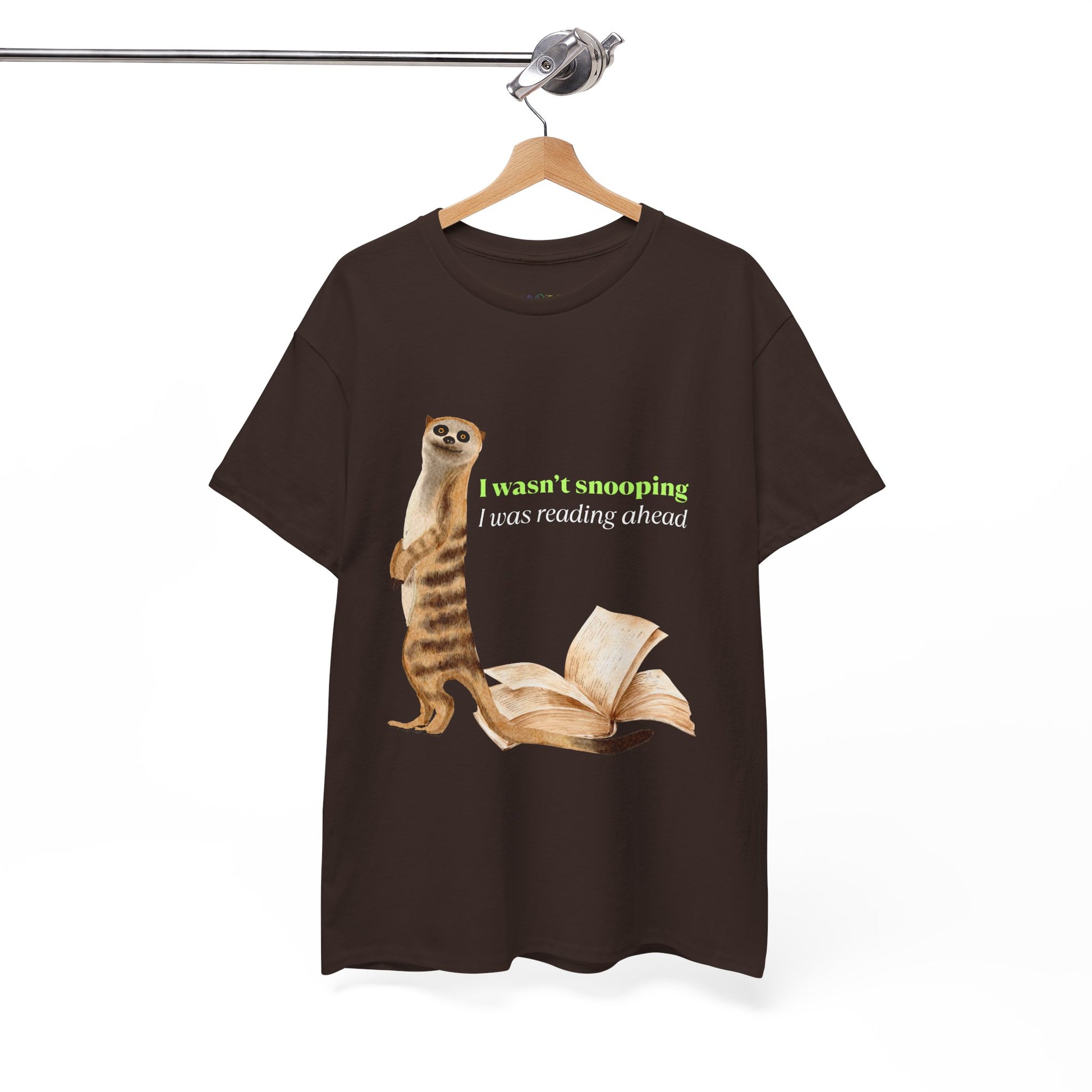 Brown t-shirt with a sheepish meerkat, back to an open book, text 'I Wasn't Snooping, I Was Reading Ahead'