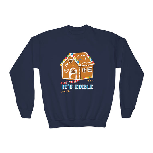Navy blue sweatshirt with a gingerbread house graphic and text 'Plot Twist, It's Edible' on a white background