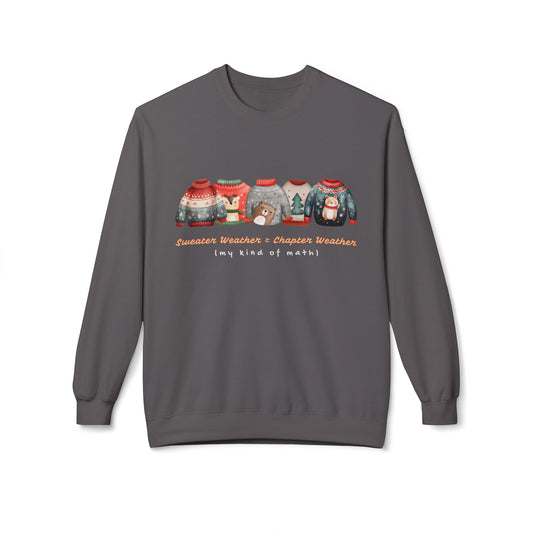 Gray sweatshirt with Christmas-themed sweaters all lined up and text 'sweater weather = chapter weather (my kind of math)