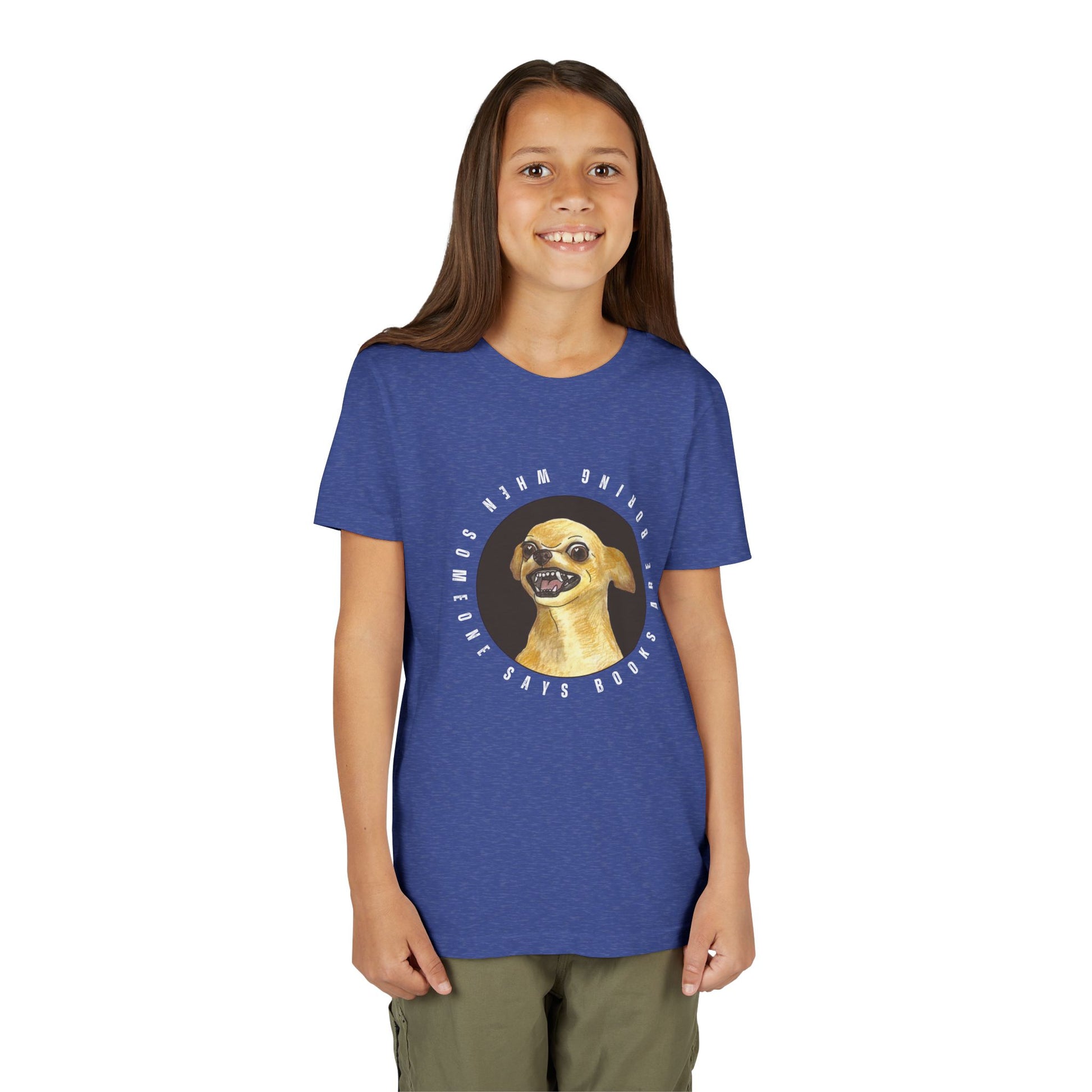Girl wearing a blue t-shirt with a growling chihuahua graphic and text 'When Someone Says Books Are Boring'