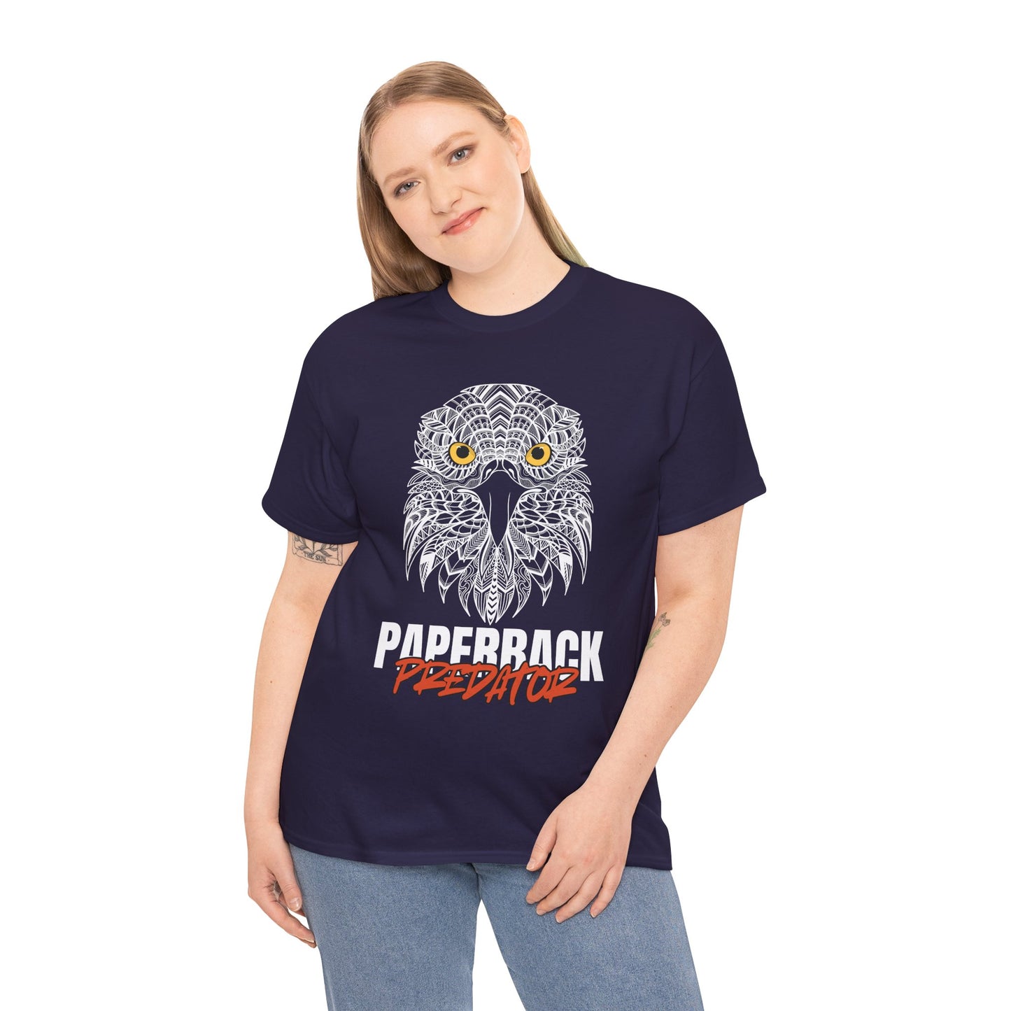 Woman wearing a blackberry t-shirt with a yellow eyed hawk and text 'PAPERBACK PREDATOR' 