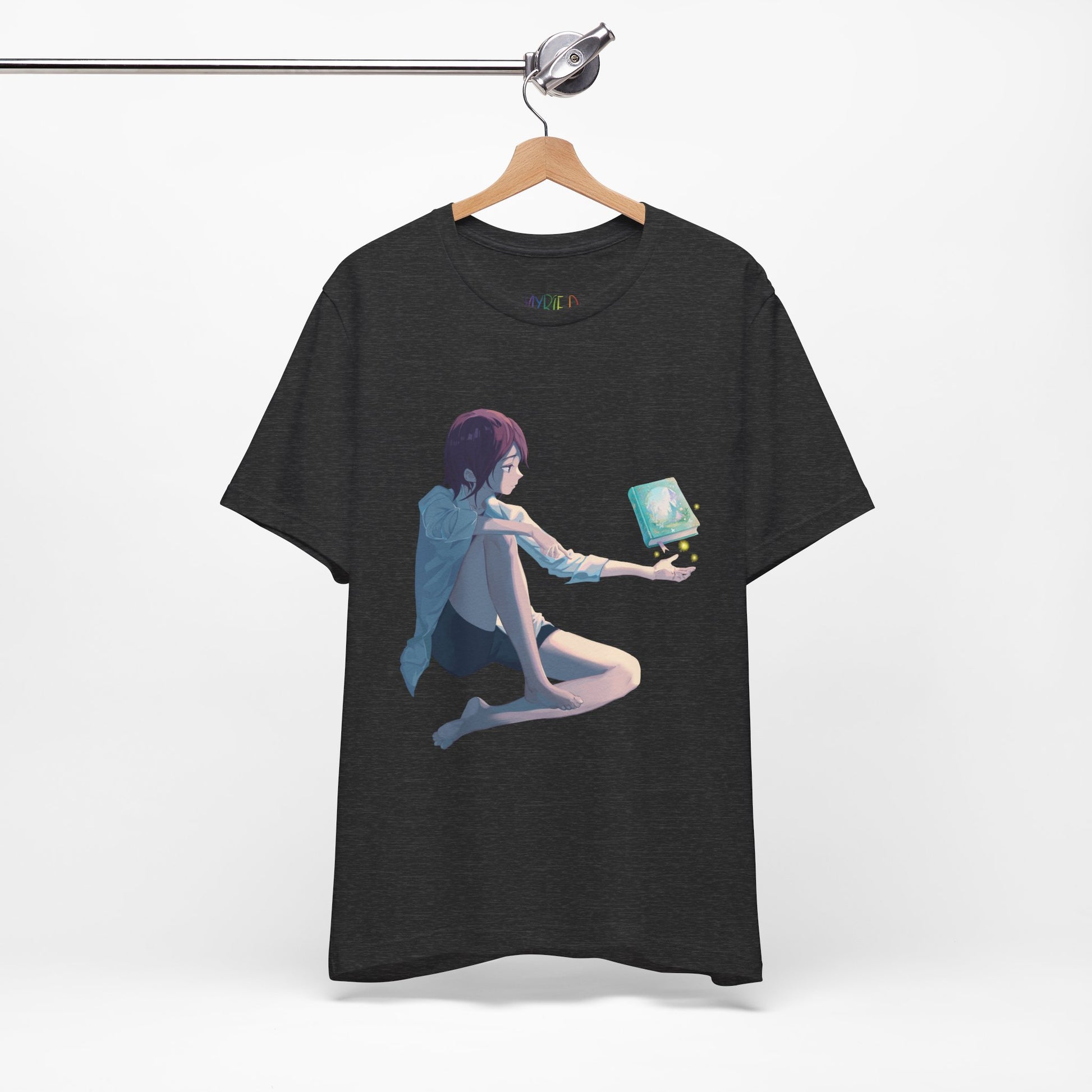 Dark gray t-shirt with a fantasy illustration of a person holding their palm up as a book magically floats above it