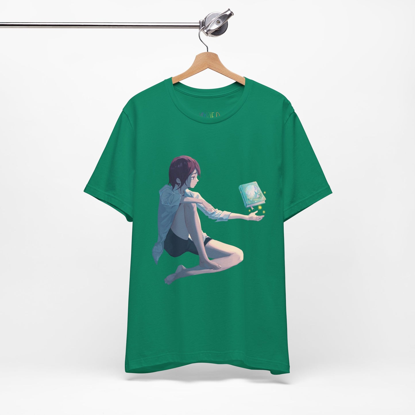 Green t-shirt with a fantasy illustration of a person holding their palm up as a book magically floats above it