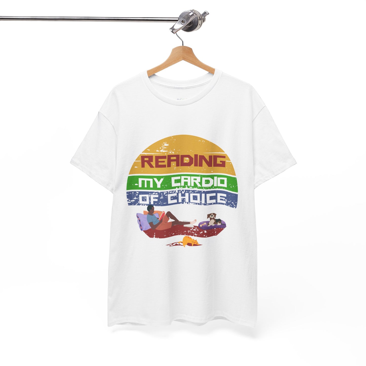 White retro t-shirt with a colorful striped circle featuring a man reading a book alongside his dog and cat, and text 'Reading, My Cardio Of Choice' 