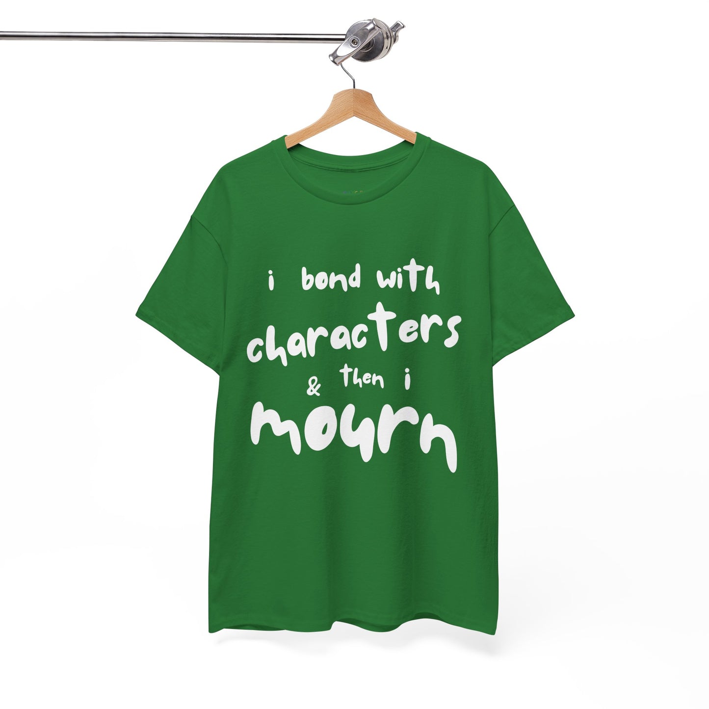 Green t-shirt with exaggerated sized letters and text 'I Bond With Characters & Then I Mourn'